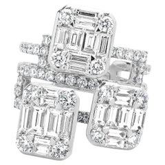 18 Karat White Gold Round and Baguette Mosaic Set Three Station Diamond Ring