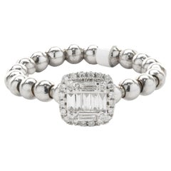 18 Karat White Gold Round and Baguette Stretch Ring