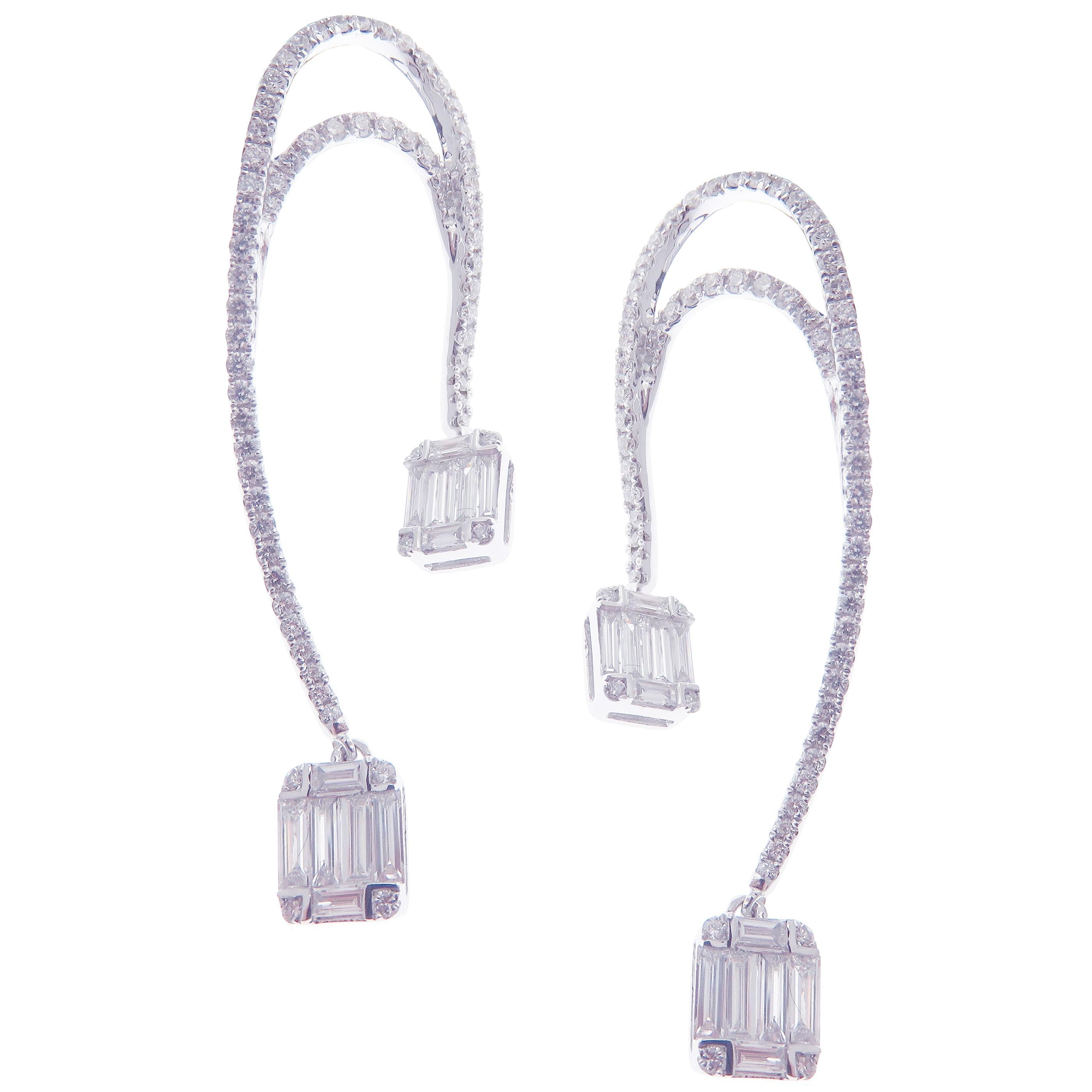 These trendy cushion-shape illusion linear dangling earrings with white baguette diamonds are crafted in 18-karat white gold, featuring 134 round white diamonds totaling of 0.83 carats and 24 baguette white diamonds totaling of 0.79 carats.
These