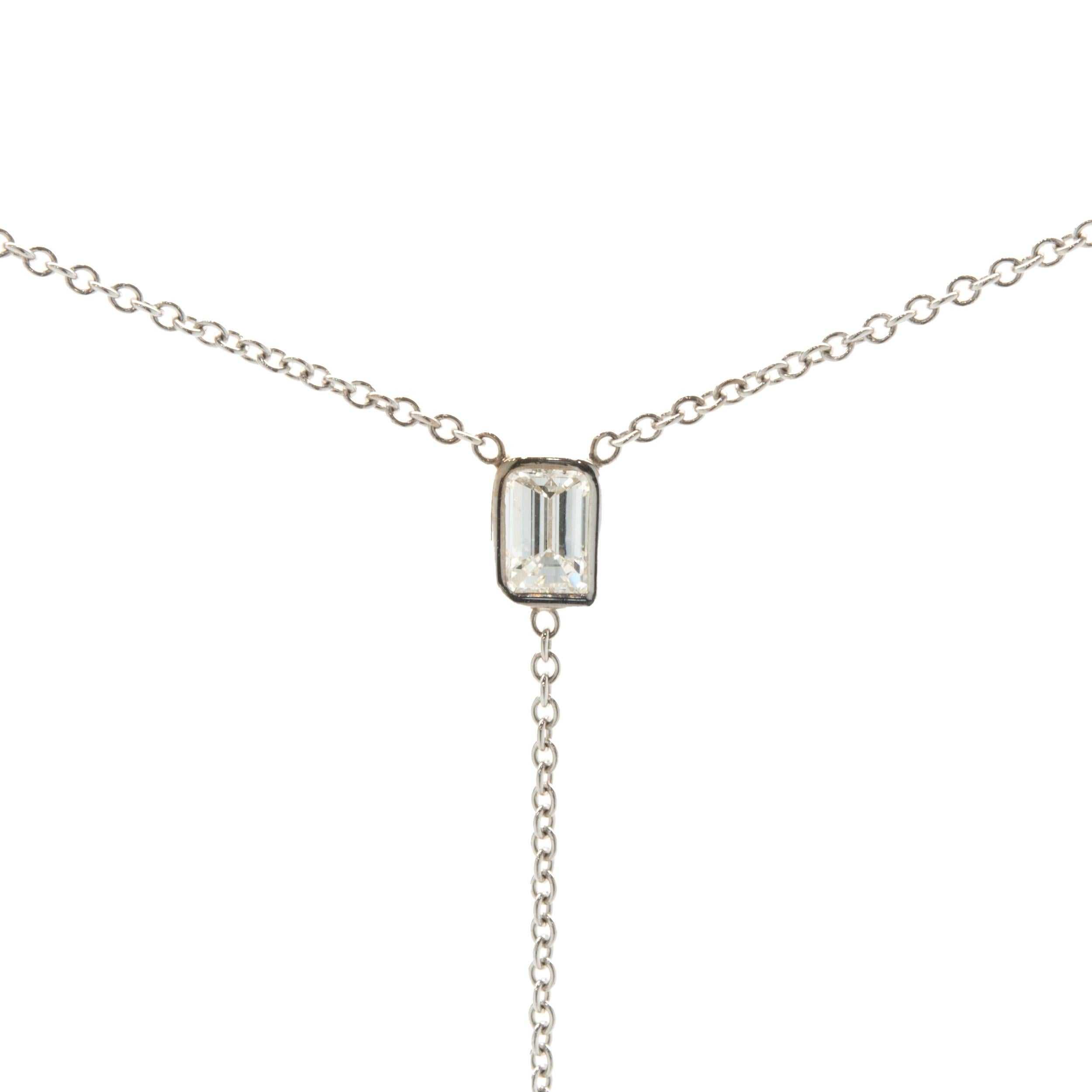Designer: custom design
Material: 18K white gold
Diamond: 8 round brilliant cut = 1.24cttw
Color: G
Clarity: VS2
Diamond: 3 emerald cut = 1.28cttw
Color: G
Clarity: VS2
Dimensions: necklace measures 24.5-inches in length 
Weight: 3.87 grams
