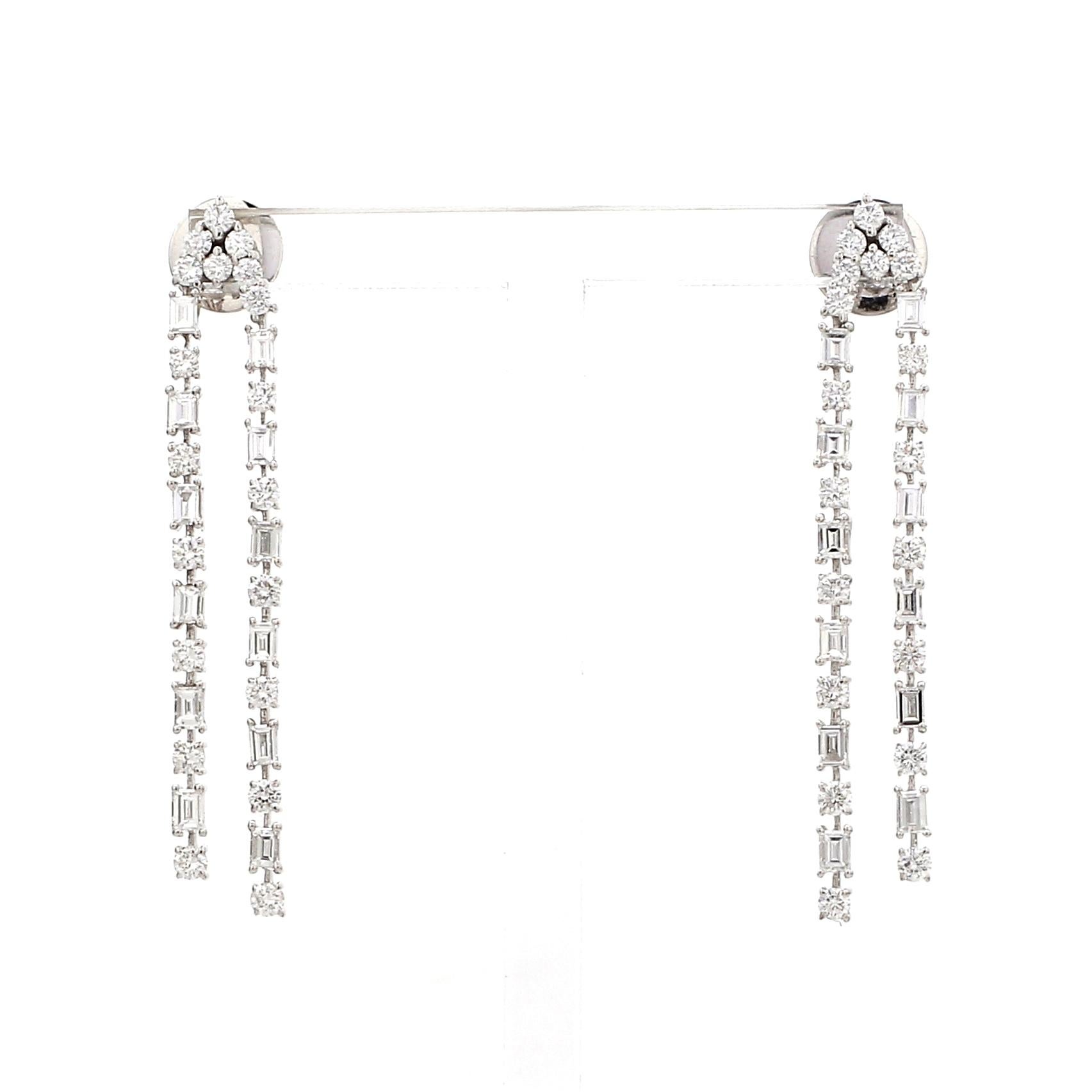 A Beautiful Handcrafted Earring in 18 Karat White Gold  with Diamonds in Round and Baqquett cut. A perfect Evening Wear for occasion

Natural Diamond Details
Pieces : 62 Pieces
Weight : 2.14 Carat 
Clarity of Diamond : VS
Colour of Diamond : G/H