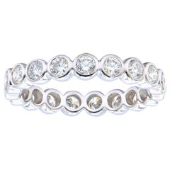 18 Karat White Gold Round Bezel Set Diamond Eternity Band