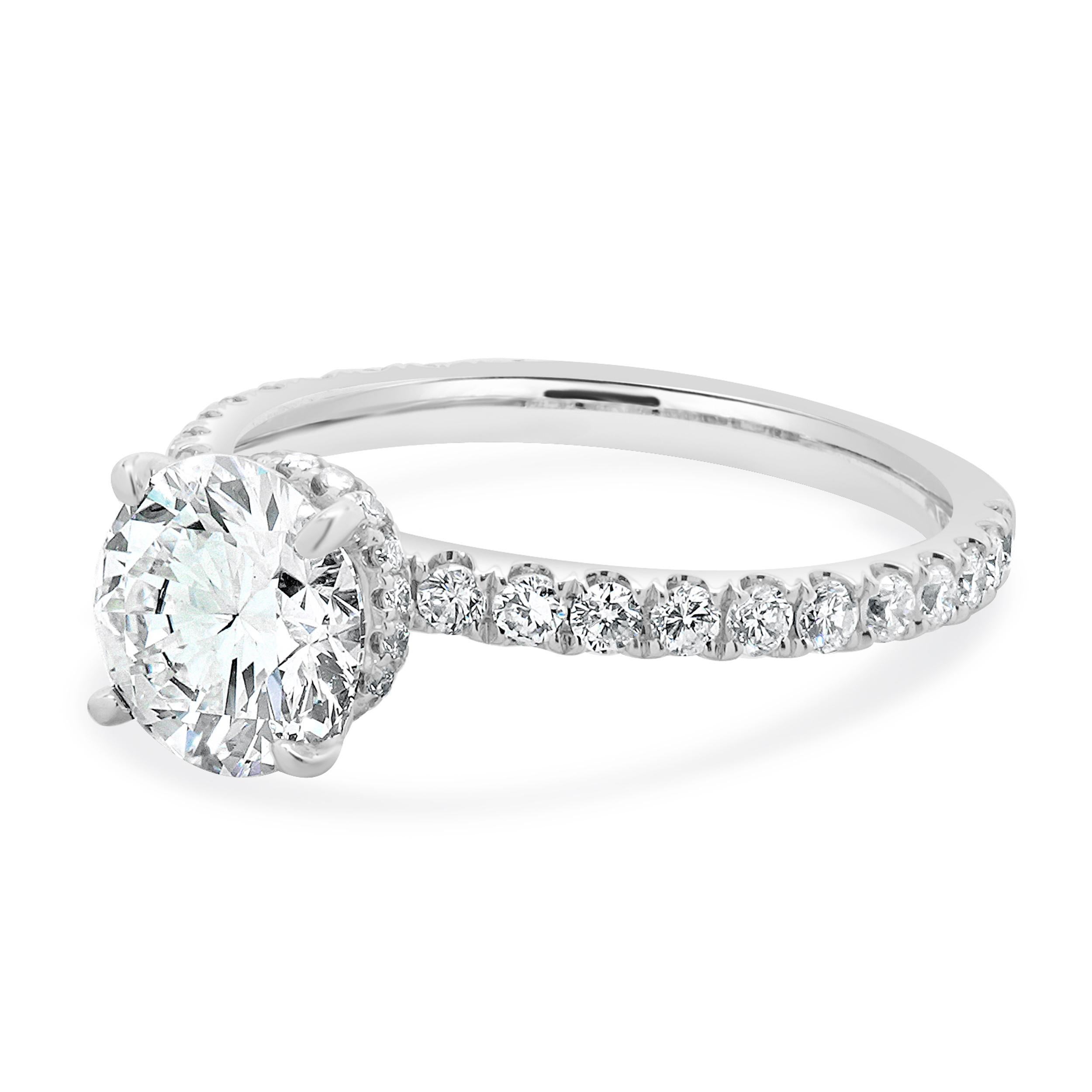 Designer: custom
Material: 14K white gold
Center Diamond: 1 round brilliant cut = 1.40ct
Color : G
Clarity : SI1
GIA: 2239059615
Diamond: 40 round brilliant cut = 0.40cttw
Color: G/H
Clarity: SI1
Size: 6 complimentary sizing available 
Weight: 2.57