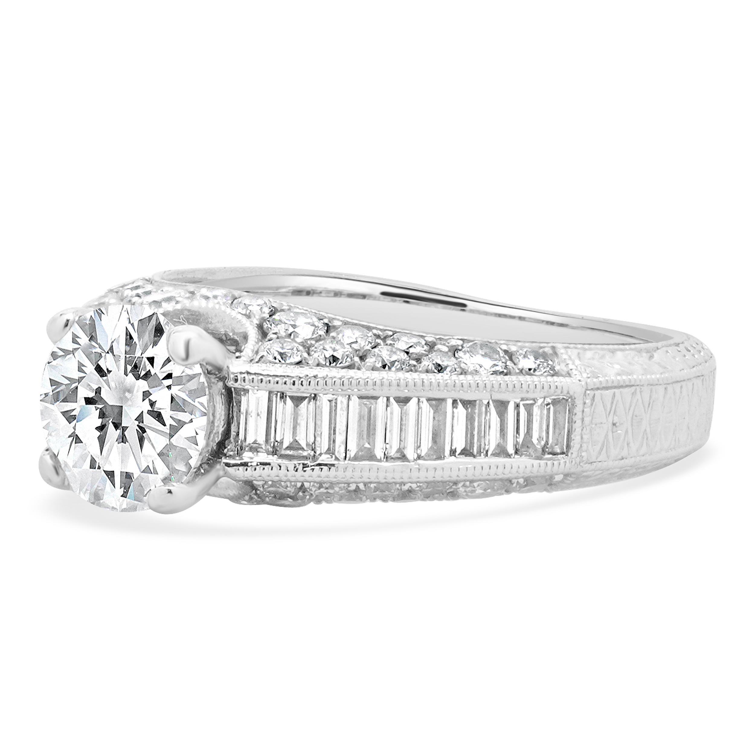 Material: 18K white gold
Center Diamond: 1 round brilliant cut = 1.02ct
Color: I
Clarity: I2
Diamond: 60 round brilliant & baguette cut = 0.93cttw
Color: H
Clarity: SI1
Ring Size: 7 (please allow up to 2 additional business days for sizing