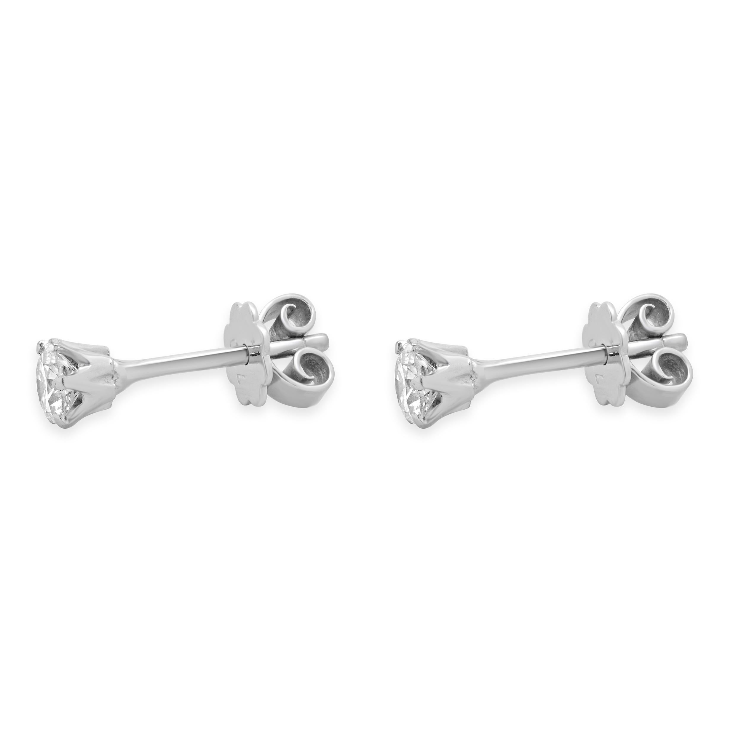 Designer: custom design
Material: 18K white gold
Diamonds: 2 round brilliant cut =0.80cttw
Color: I
Clarity: SI2-3
Dimensions: earrings measure 5mm 
Weight: 1.95 grams

