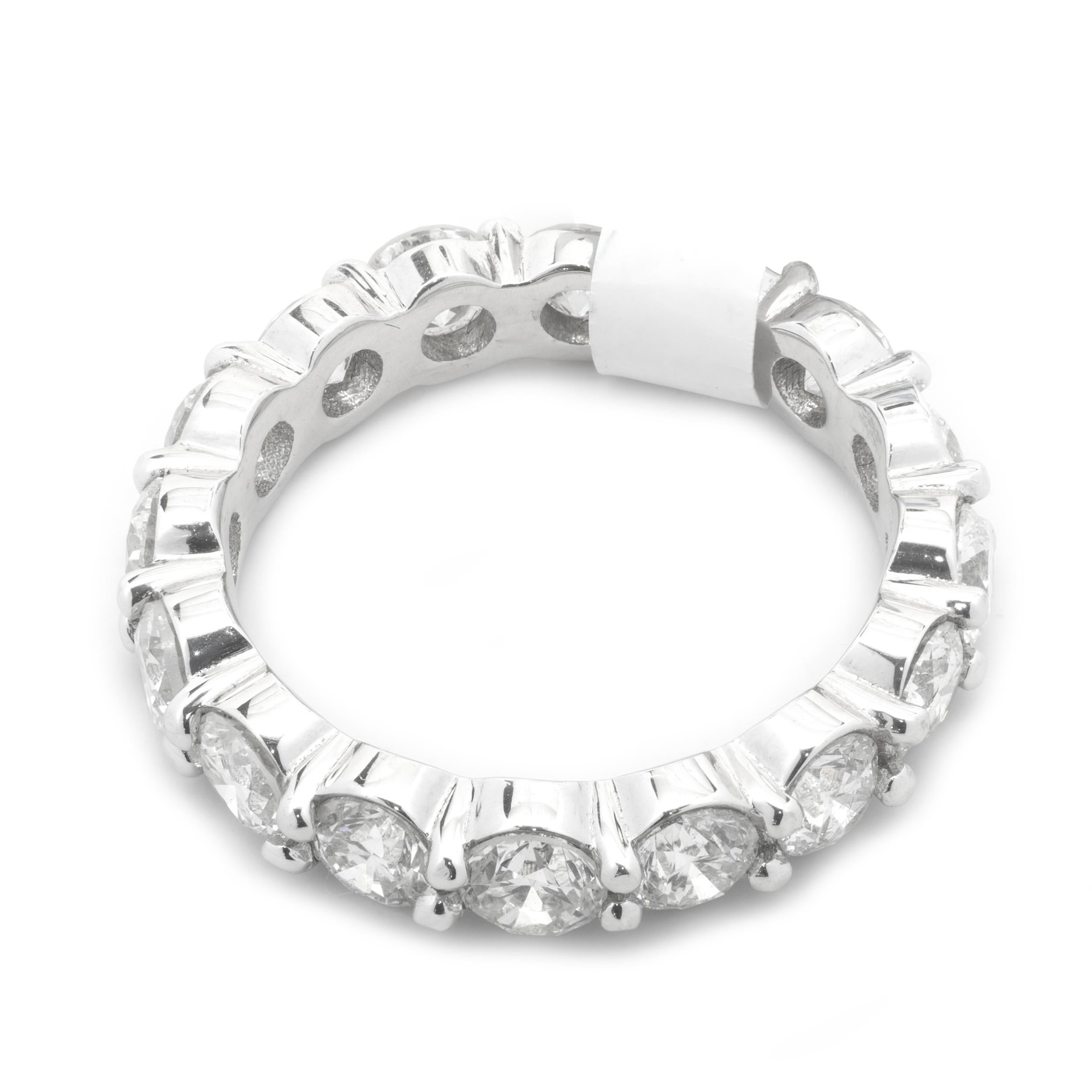 Designer: Custom
Material: 18K white gold 
Diamonds: 16 round brilliant cut = 3.80cttw 
Color: H/I
Clarity: SI1
Size: 7
Dimensions: ring measures 4.30mm in width
Weight: 4.50 grams
