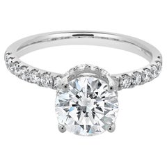 Anillo de compromiso de oro blanco de 18 quilates con diamante redondo