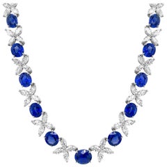 18 Karat White Gold Royal Blue Natural Corundum Blue Oval Sapphire Necklace