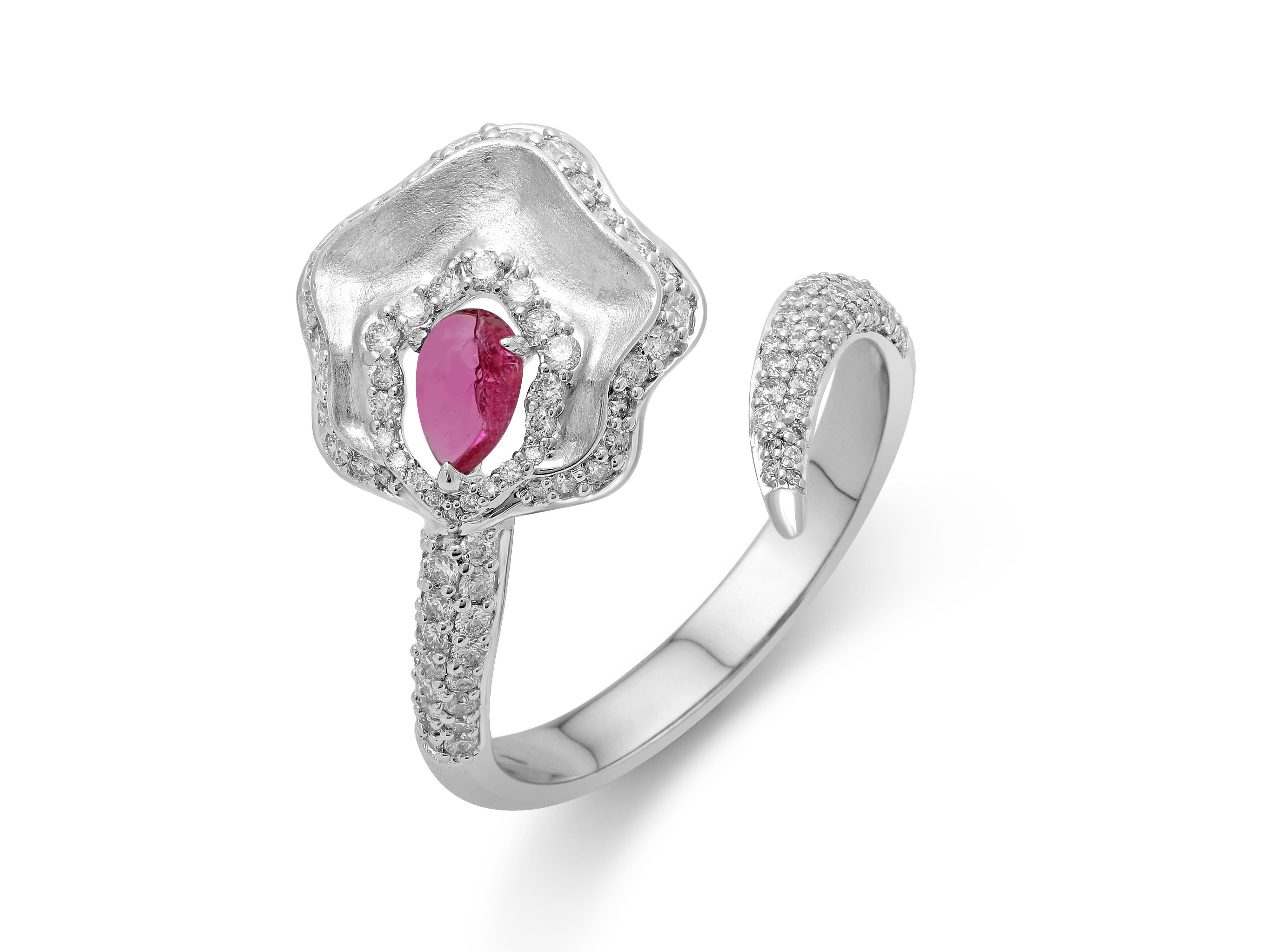 A stunning rubellite and diamond ring with a matte finish to create a subtle yet sophisticated look.

•	Total Diamond Weight: 0.49 carats of round, brilliant-cut diamonds 	
•	Rubellite: 0.24 carats
•	Diamond quality/colour: VS/FG (clean,