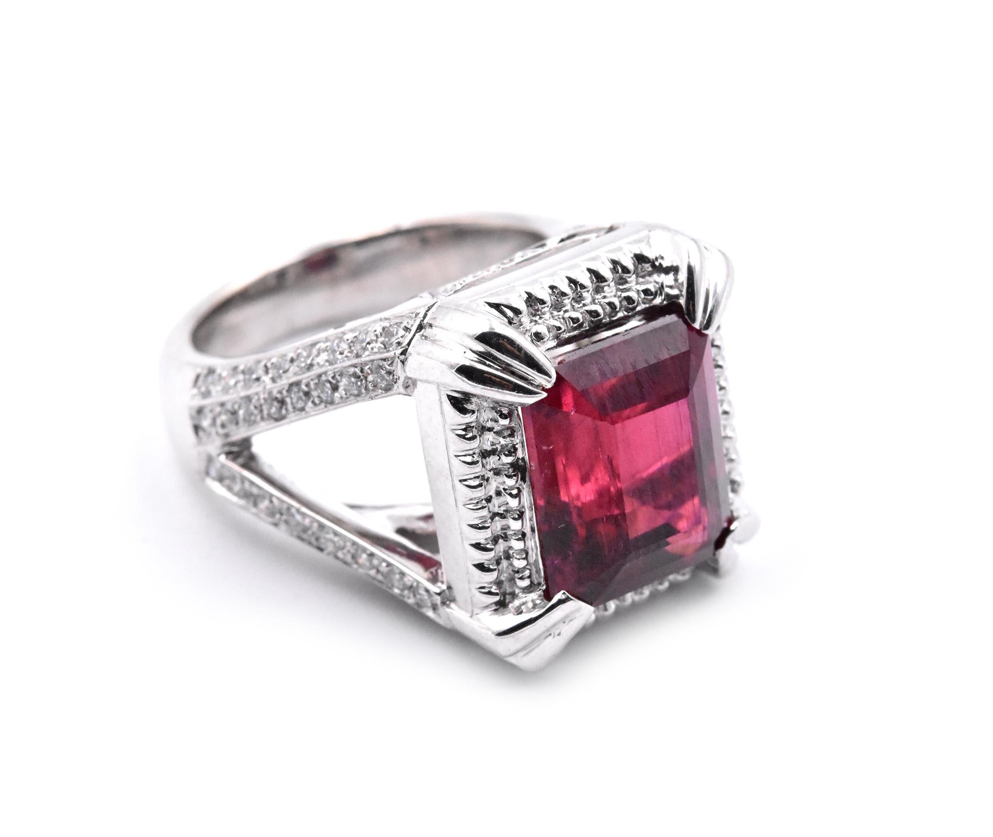 Material: 18k white gold
Gemstones: Emerald Cut Rubellite Tourmaline = 6.00ct
Diamonds:  82 round brilliant cuts = 1.50cttw
Color: G
Clarity: VS
Ring Size: 5.5 (please allow two additional shipping days for sizing requests)
Dimensions: ring top