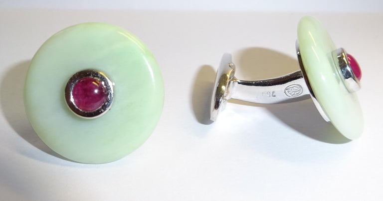 
18 Karat White Gold Ruby and Chrysoprase Cufflinks
2 Crysoprase 17.24 Carat
2 Ruby cab. 0.84

Founded in 1974, Gianni Lazzaro is a family-owned jewelery company based out of Düsseldorf, Germany.
Although rooted in Germany, Gianni Lazzaro's style