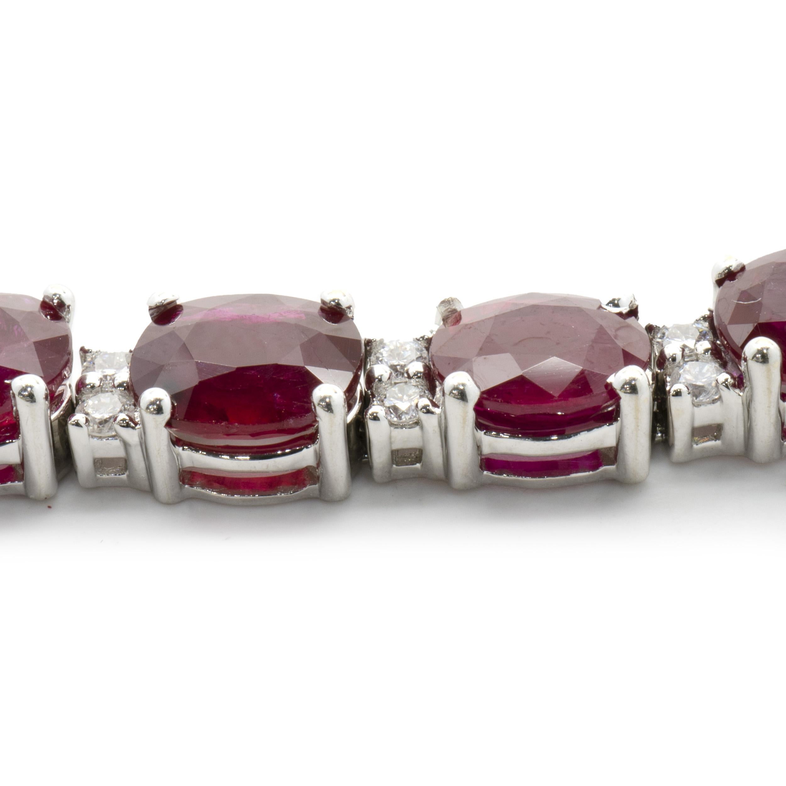 18 Karat White Gold Ruby and Diamond Alternating Inline Bracelet In Excellent Condition For Sale In Scottsdale, AZ