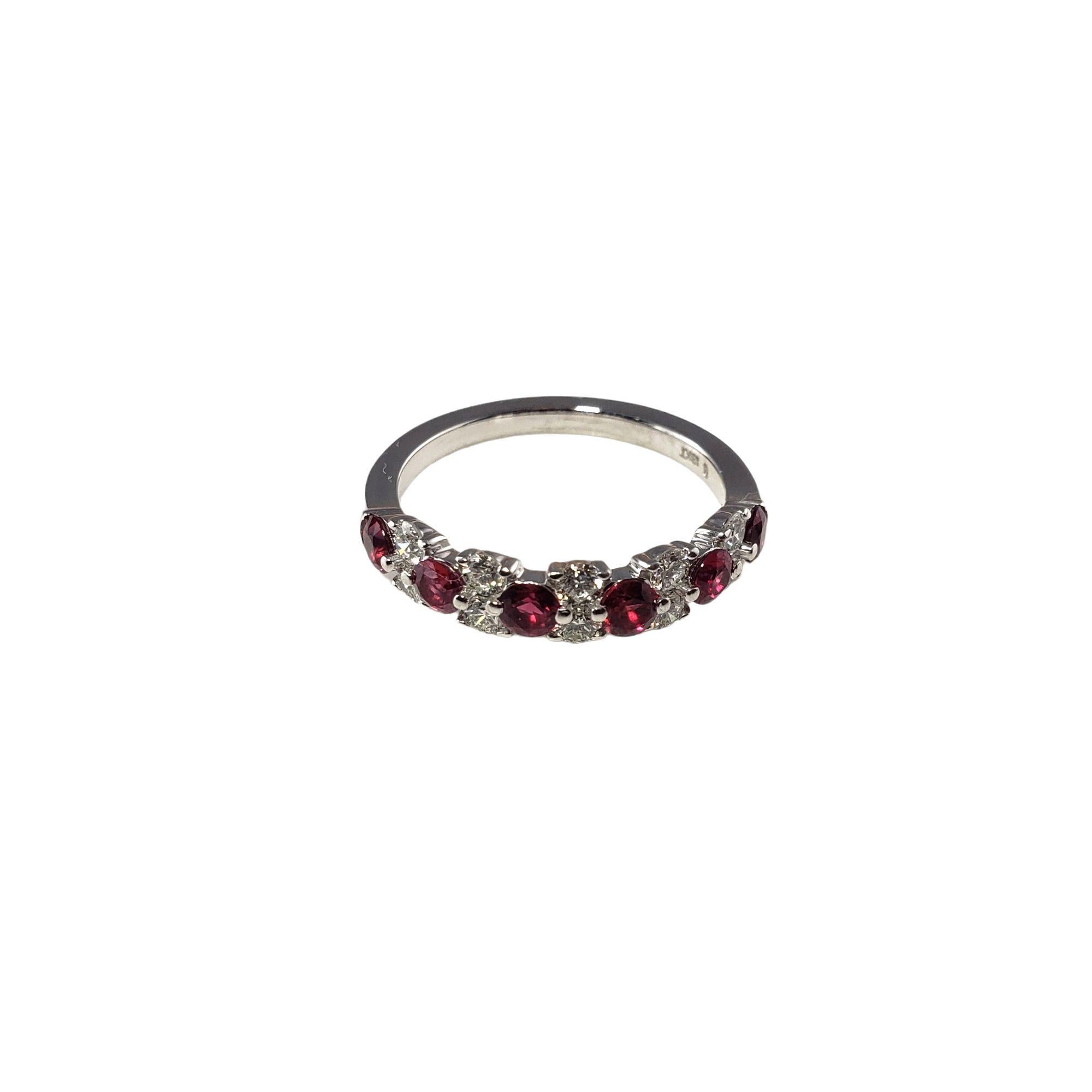 Vintage 18 Karat White Gold Ruby and Diamond Ring Size 6 JAGi Certified-

This lovely ring features six round cut natural rubies and ten round brilliant cut diamonds set in classic 18K white gold.  Width:  4 mm.

Shank:  2 mm.

Total diamond weight: