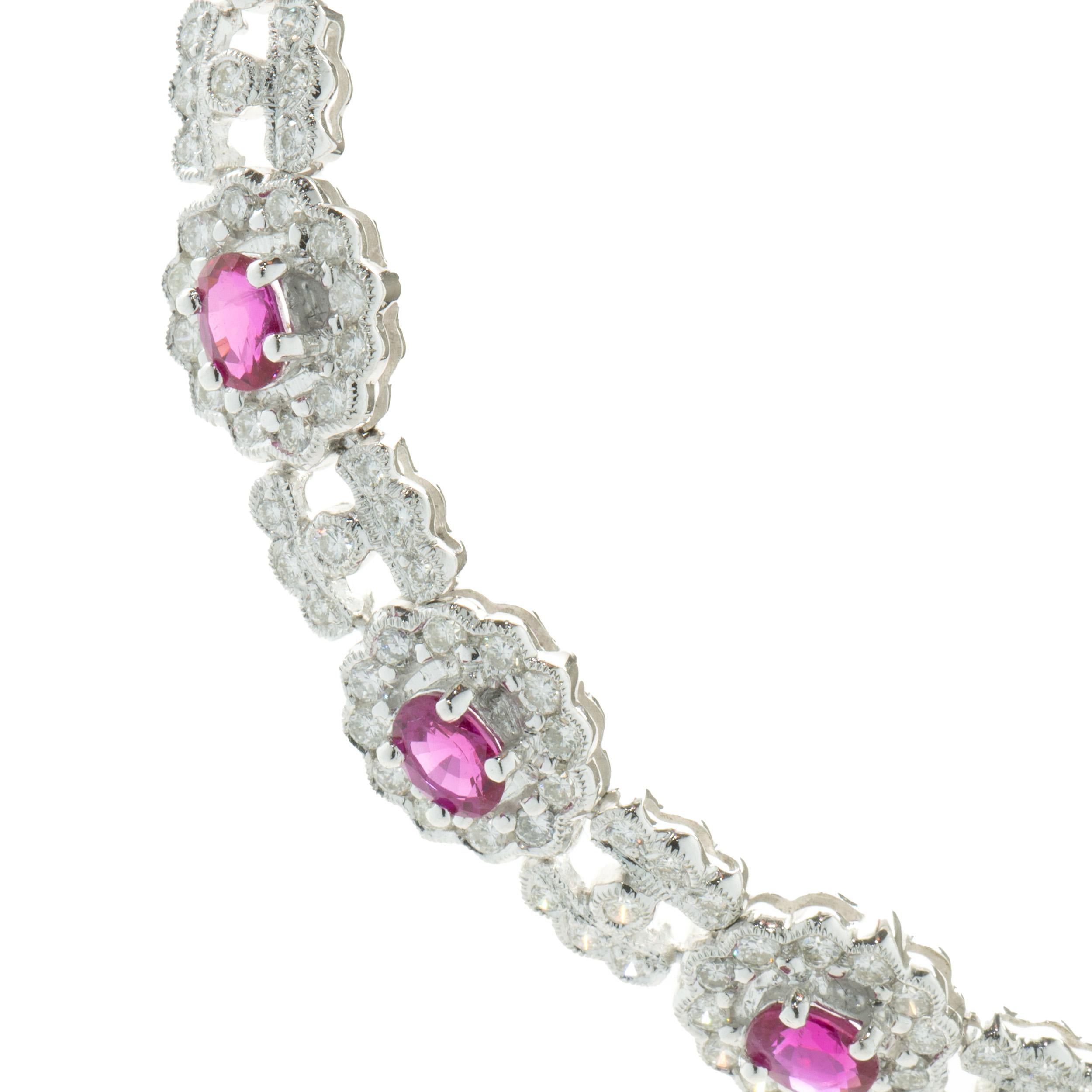 Designer: custom
Material: 18K white gold
Diamond: 178 round brilliant cut = 1.04cttw
Color: H
Clarity: SI1
Ruby: 9 oval cut = 1.71cttw
Dimensions: necklace measures 13-inches in length
Weight: 22.62 grams