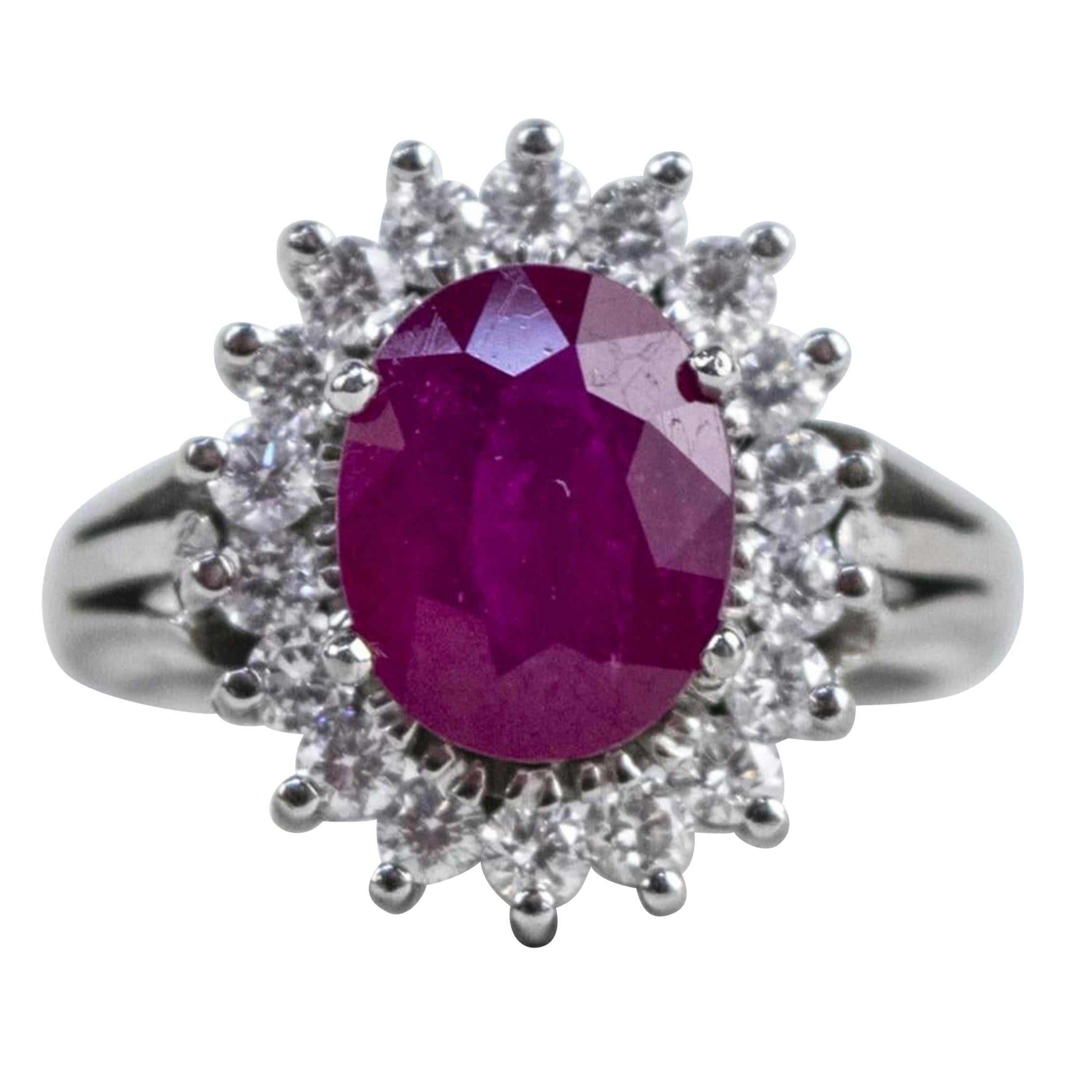 18 Karat White Gold Ruby and Diamond Halo Set Fashion Ring For Sale