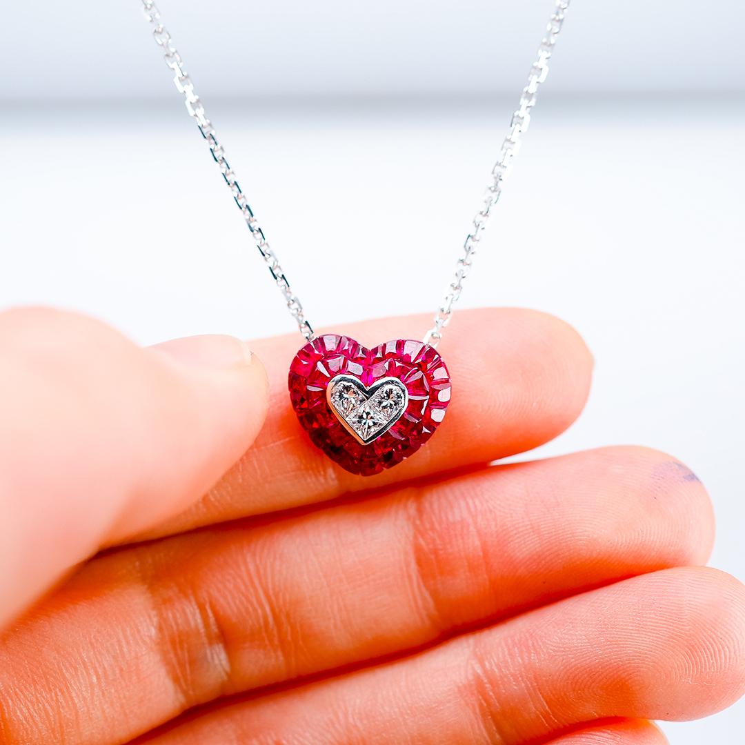 We design a very nice Heart pendant with necklace .The technique use invisible setting .We cut and groove very stone. This pendant is very nice style you can use in many occasion in day time and evening time for party. We use the top quality of ruby