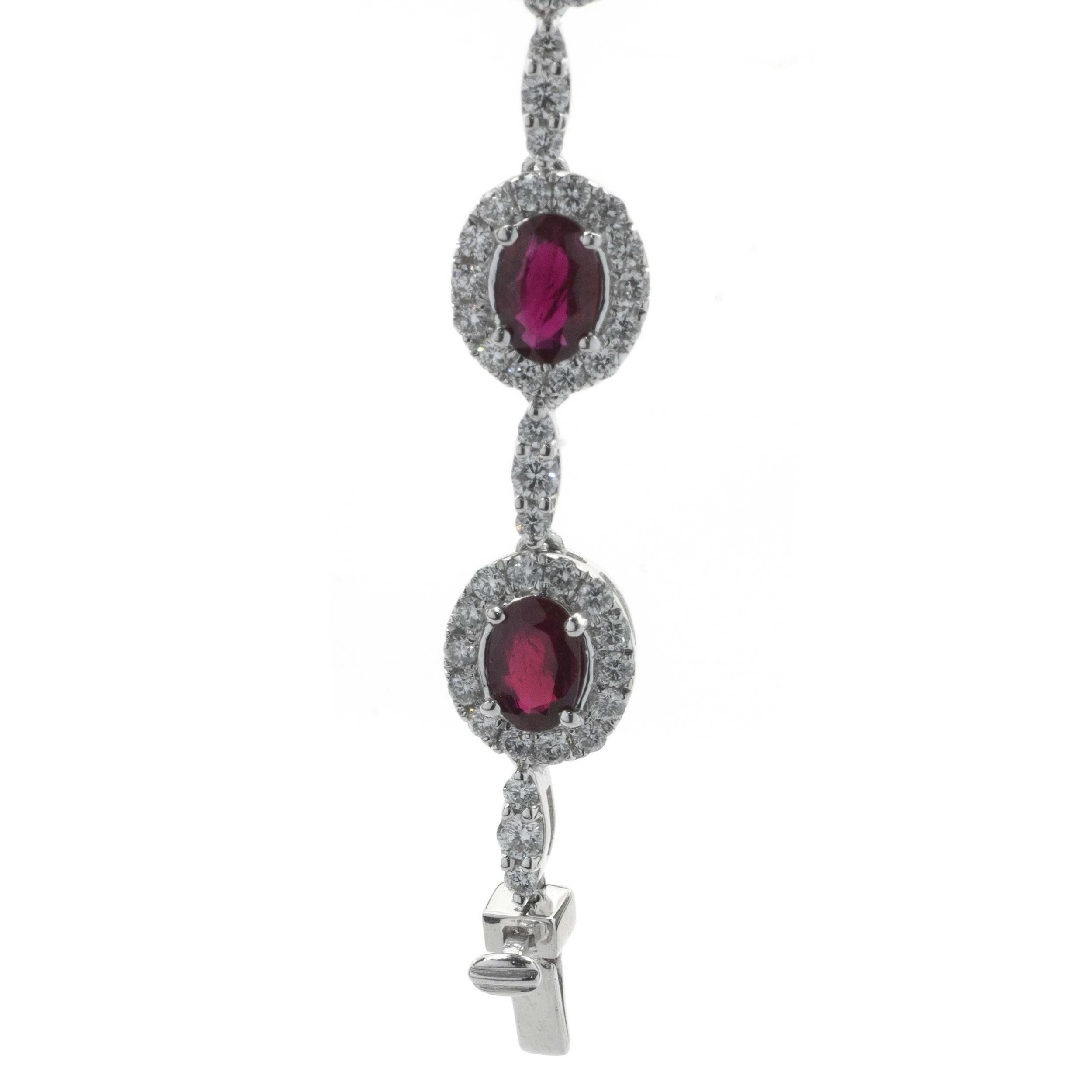 Designer: custom 
Material: 18K white gold
Diamond: 459 round brilliant cut = 6.37cttw
Color: G
Clarity: VS1
Ruby: 27 oval cut = 14.93cttw
Color: Pigeons Blood
Clarity: Fine Gem Quality, AAA+
Dimensions: necklace measures 16-inches long 
Weight: