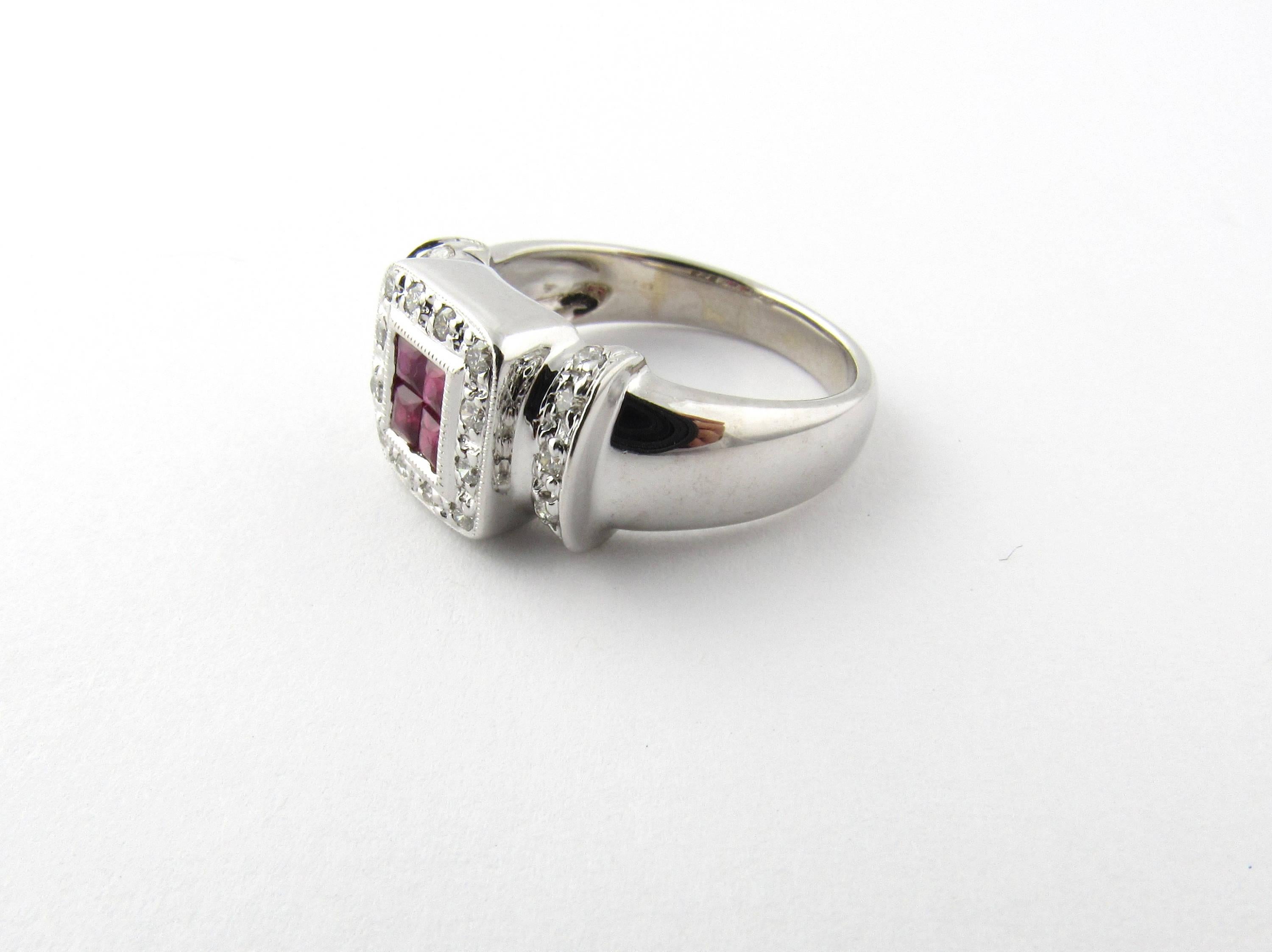 Vintage 18 Karat White Gold Natural Ruby and Diamond Ring Size 6.75- 
This gorgeous ring features four genuine princess cut rubies surrounded by 22 round brilliant cut diamonds in a white gold setting. Top of ring measures 11 mm x 10 mm.