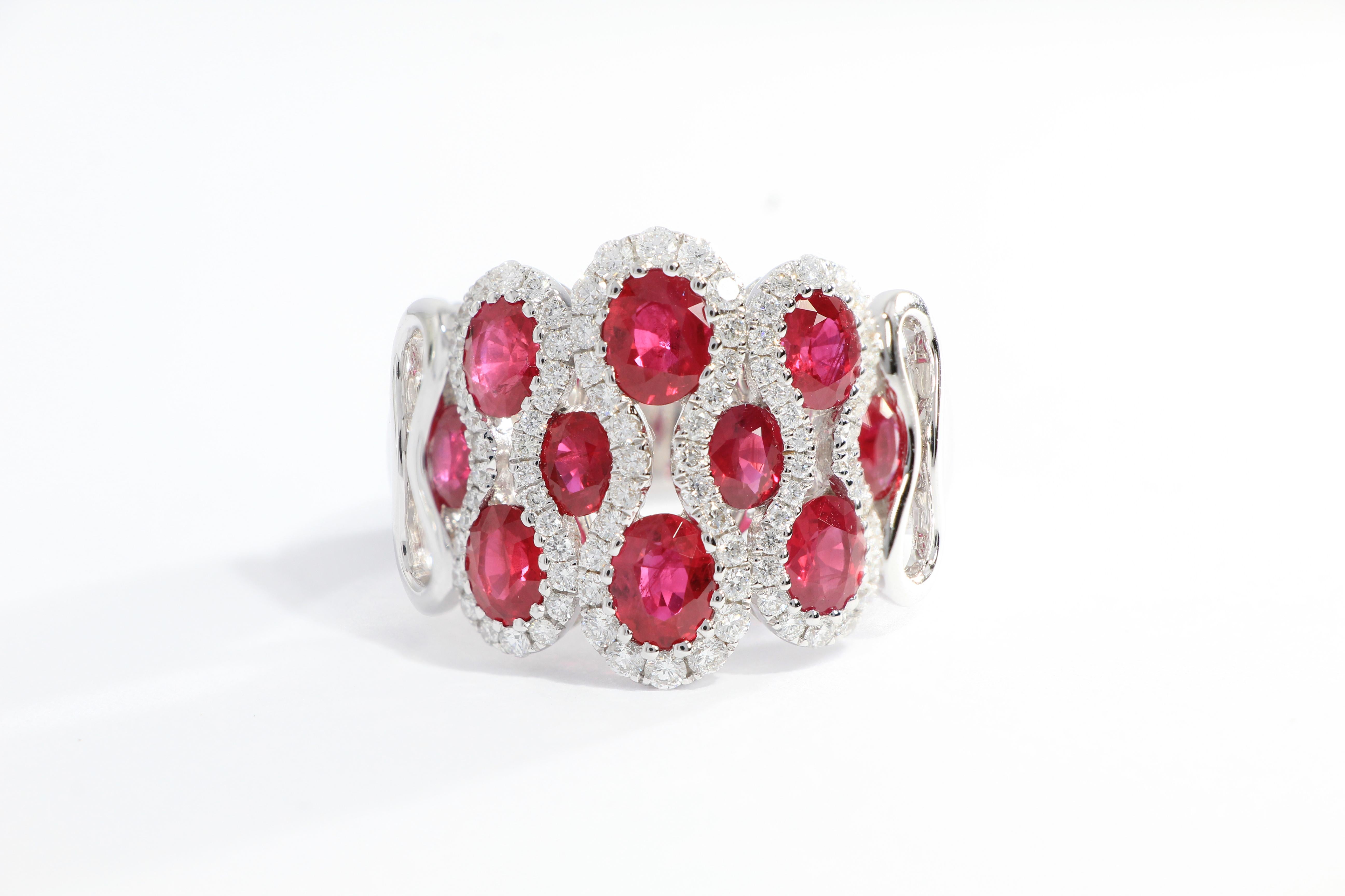 A very beautiful cocktail  ring, composed of clusters of natural rubies of stunning colour surrounded by brilliant-cut diamonds, total weighing  2.72 carats and 0.60 carats respectively, mounted in 18 karat gold.
O’Che 1867 is renowned for its high