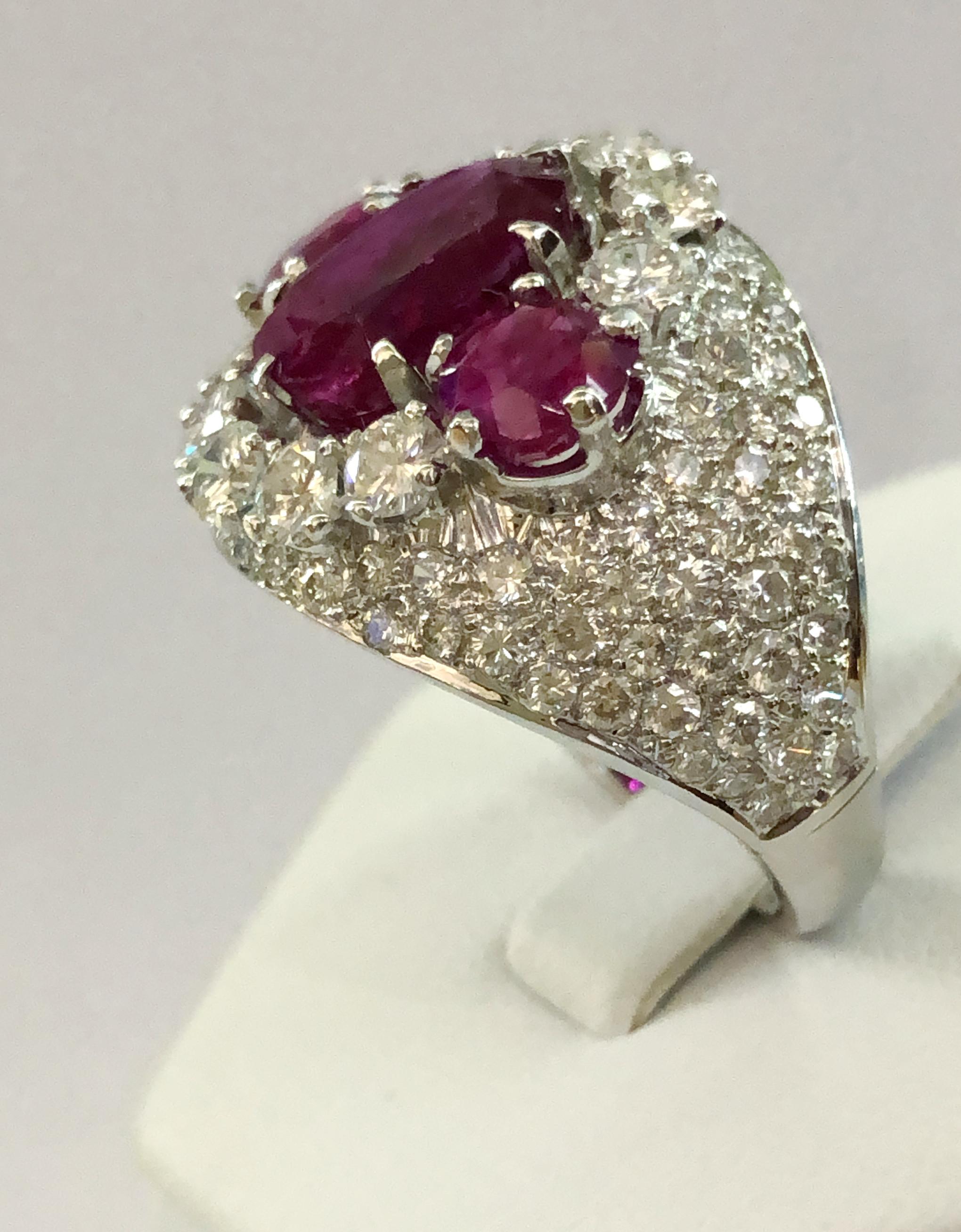 18 karat white gold ring with three rubies for a total of 3 karats and brilliant diamonds for a total of 2.5 karats mounted in Pave setting, Italy 1960-1970s
Ring size US 7