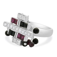 18 Karat White Gold Ruby, Diamond, and Onyx Dangle Ring