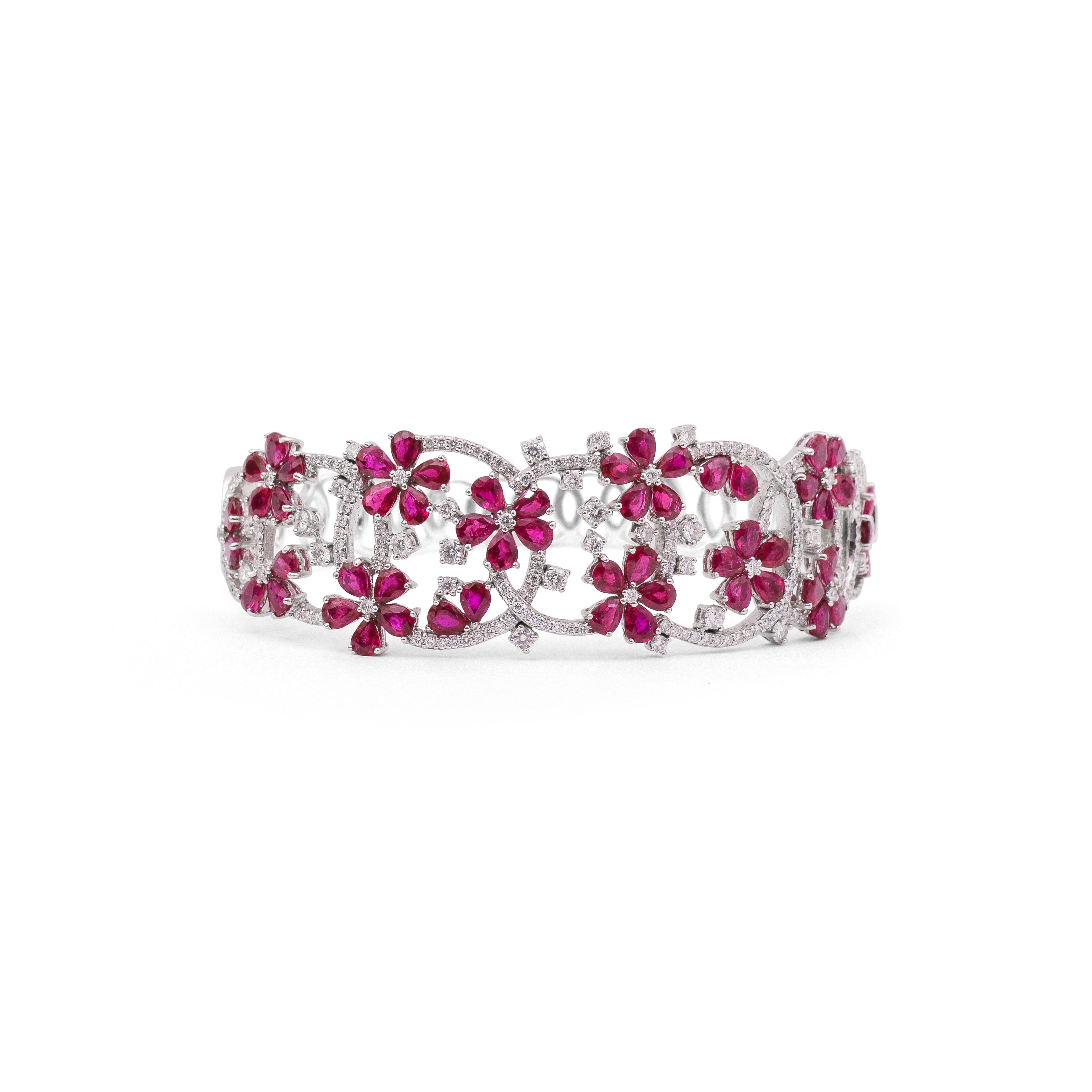 18 Karat White Gold Ruby Diamond Cuff Bracelet

This beautifully crafted 'FUN' cuff bracelet set in 18 Karat white gold studded with diamonds and rubies perfectly compliments your zest and passion for the good things in life.  Ideal for both day and