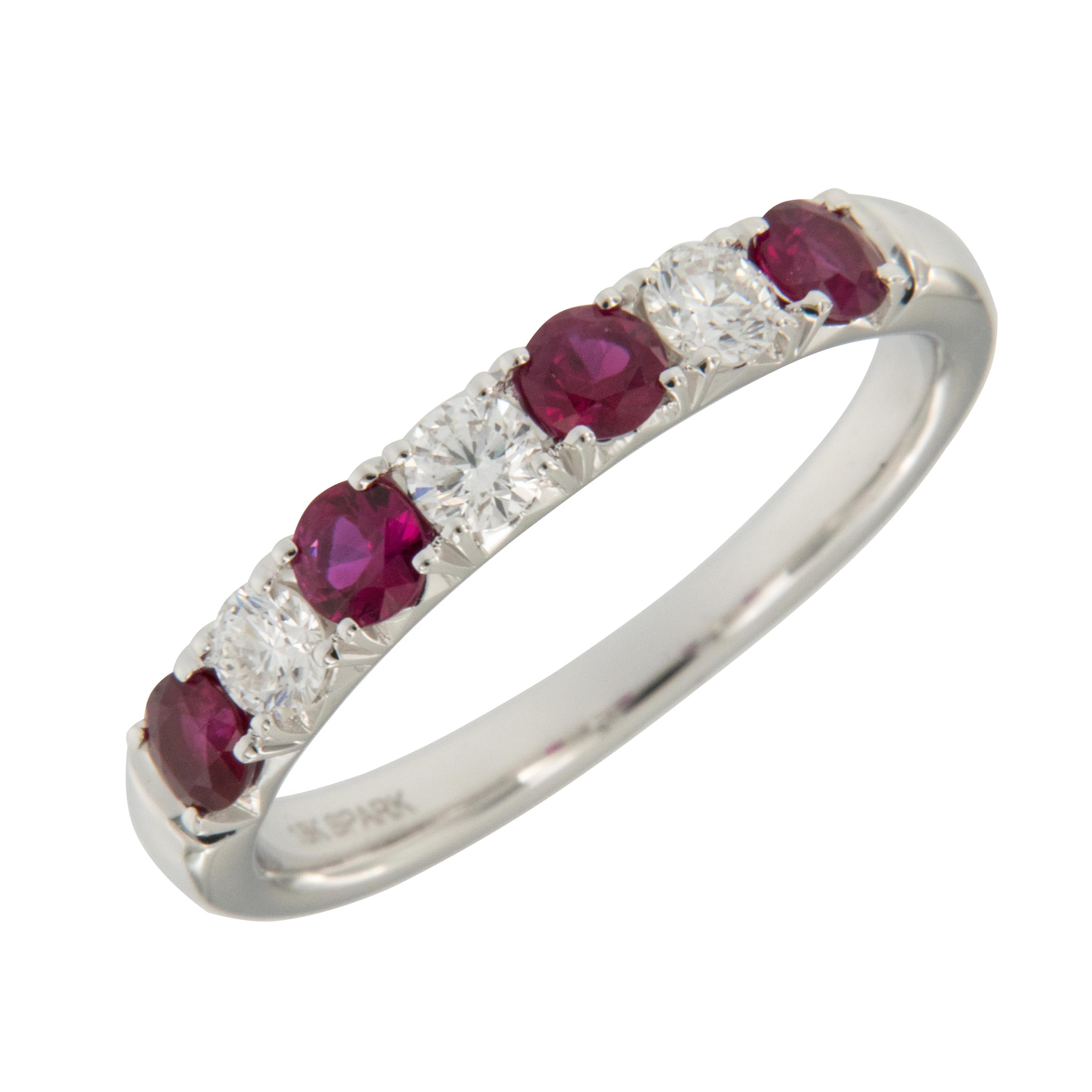 Spark is well known for making some of the most beautiful colored gemstone jewelry for the last 49 years. Crafted in fine 18 karat white gold with the most vibrant, red rubies & beautiful white diamonds, this ring looks fantastic alone or stacked