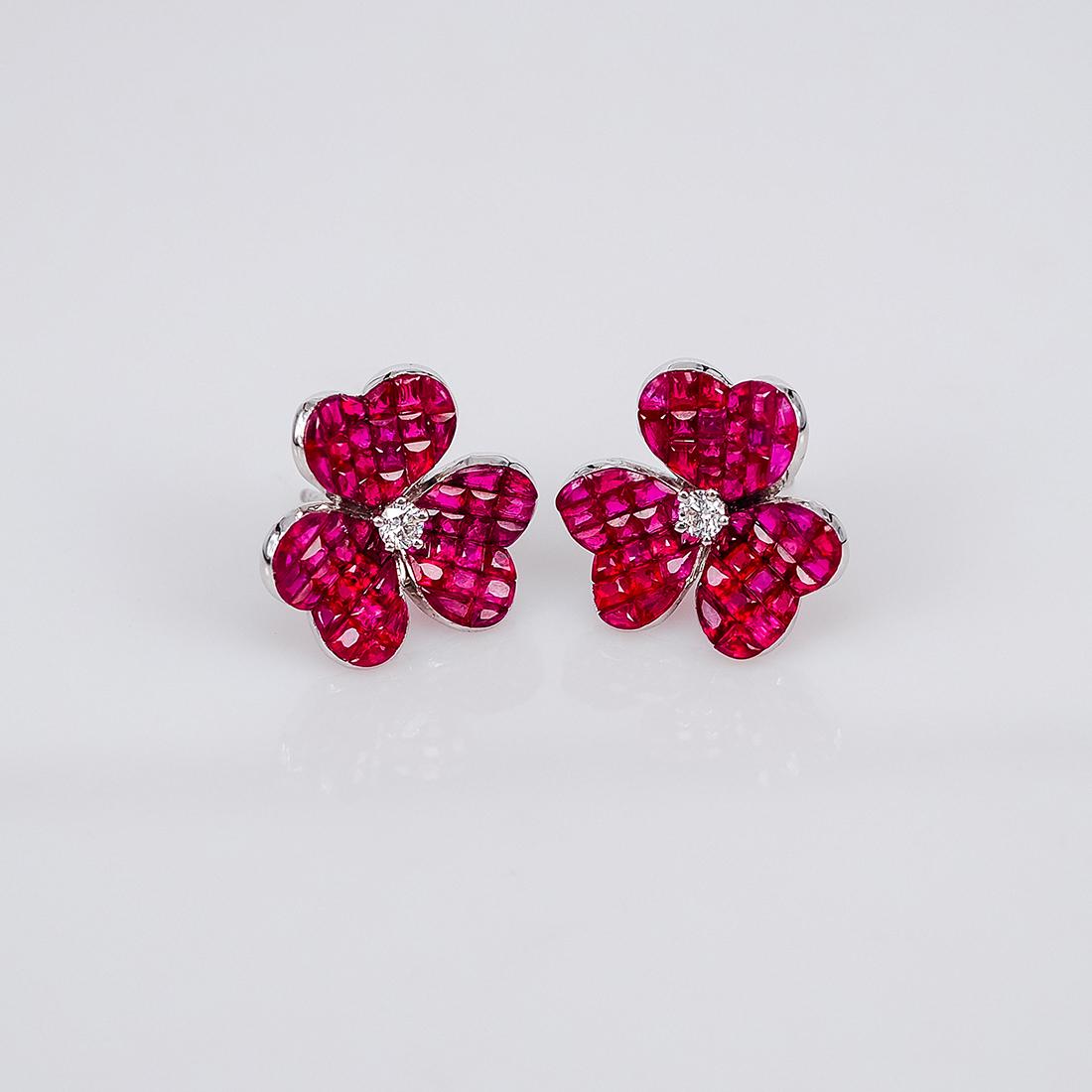 Ruby stud earrings design as classic luxury elegant style.You can use for everyday and also for the evening party.We use the top quality Ruby which make in invisible setting.We set the stone in perfection as we are professional in this kind of