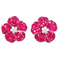 Boucles d'oreilles à fleurs invisibles en or blanc 18 carats et rubis