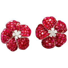 18 Karat White Gold Ruby Invisible Flower Earrings