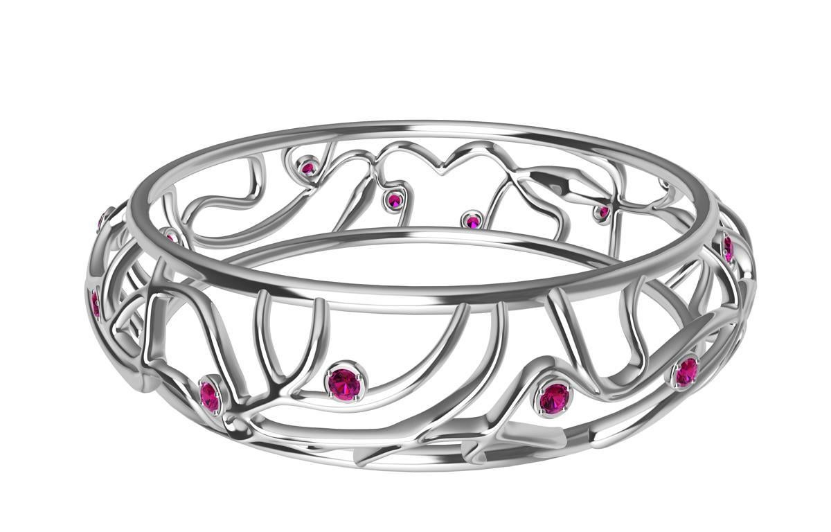 18 Karat White Gold Ruby Oceans Bangle,  14- 3mm Rubies AA diamond cut . 1.86ct wt AGTA.   My favorite place on earth. The ocean. Now with sparkling rubies. As unpredictable as the ocean. Different every time with its currents, riptides, and the