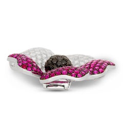 18 Karat White Gold Ruby, White Diamond and Black Diamond Flower Pin