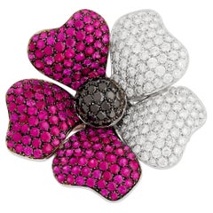 18 Karat White Gold Ruby, White Diamond and Black Diamond Flower Pin