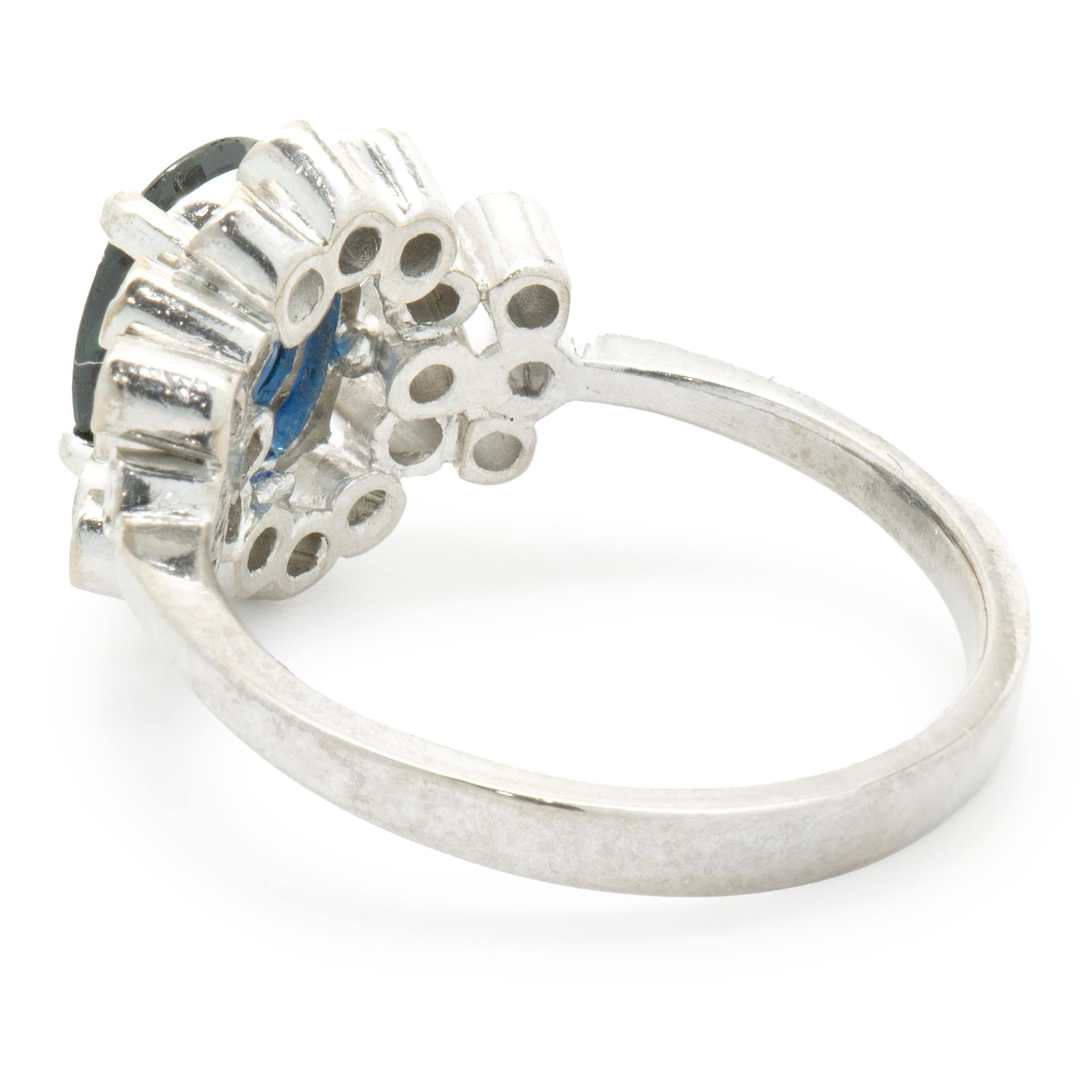 Oval Cut 18 Karat White Gold Sapphire and Bezel Set Diamond Ring For Sale