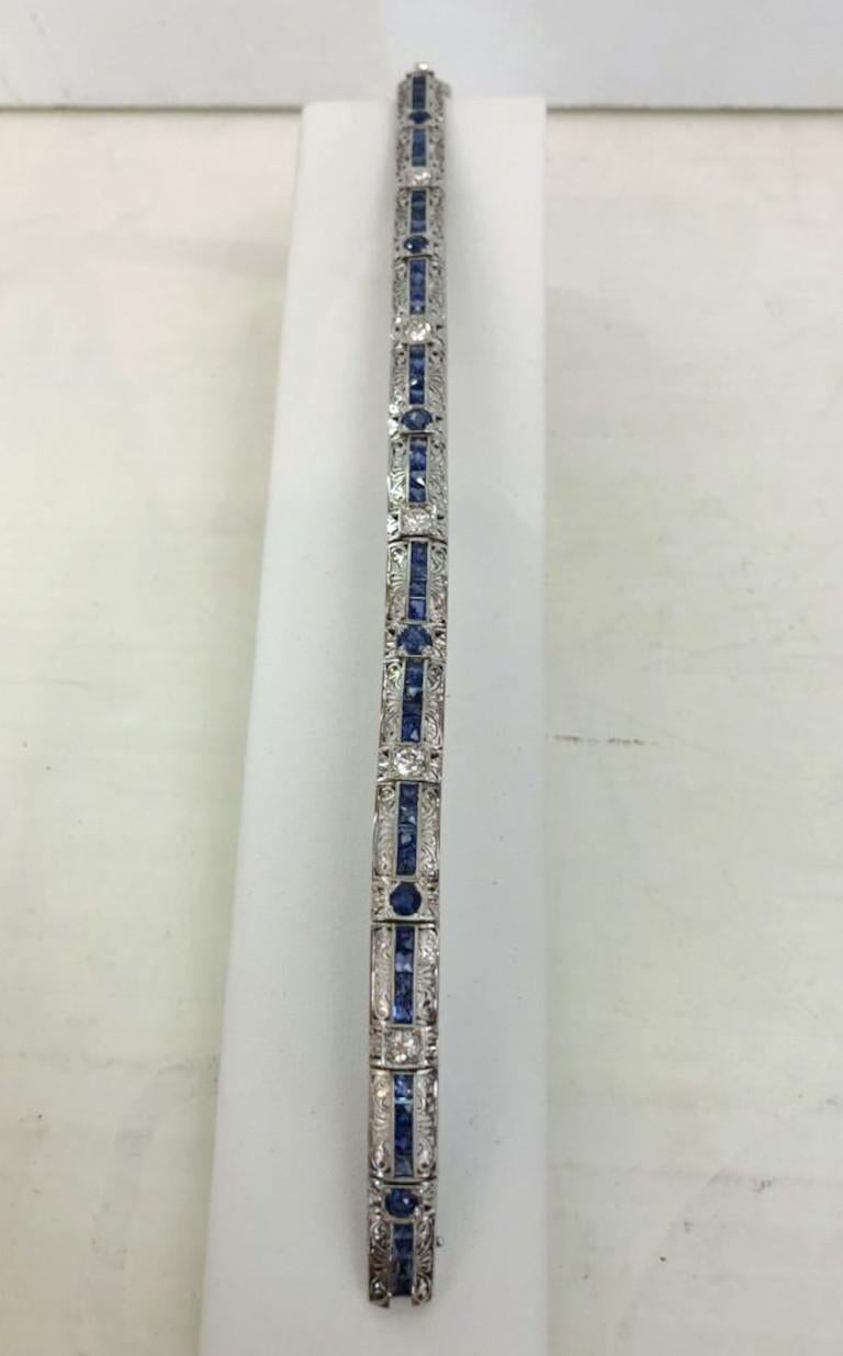 Vintage Italian bracelet in 18 karat white gold, mounted in fretwork synthetic sapphires and diamonds for a total of 0.9 carats / Made in Italy 1930s