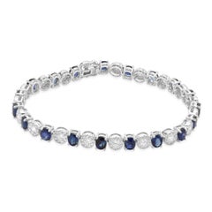 18 Karat White Gold Sapphire and Diamond Cluster Station Inline Bracelet