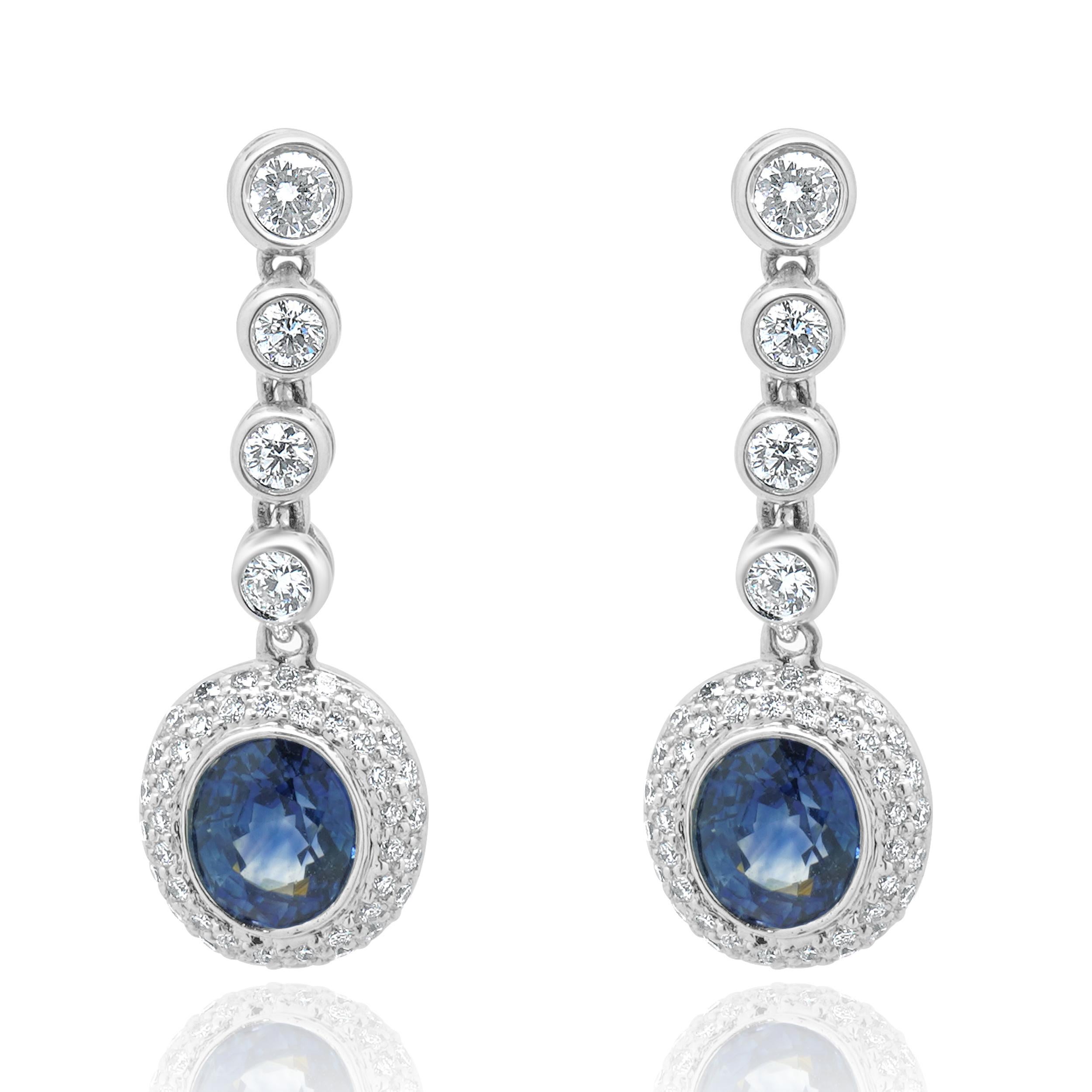 Boucles d'oreilles pendantes en or blanc 18 carats saphir et diamant