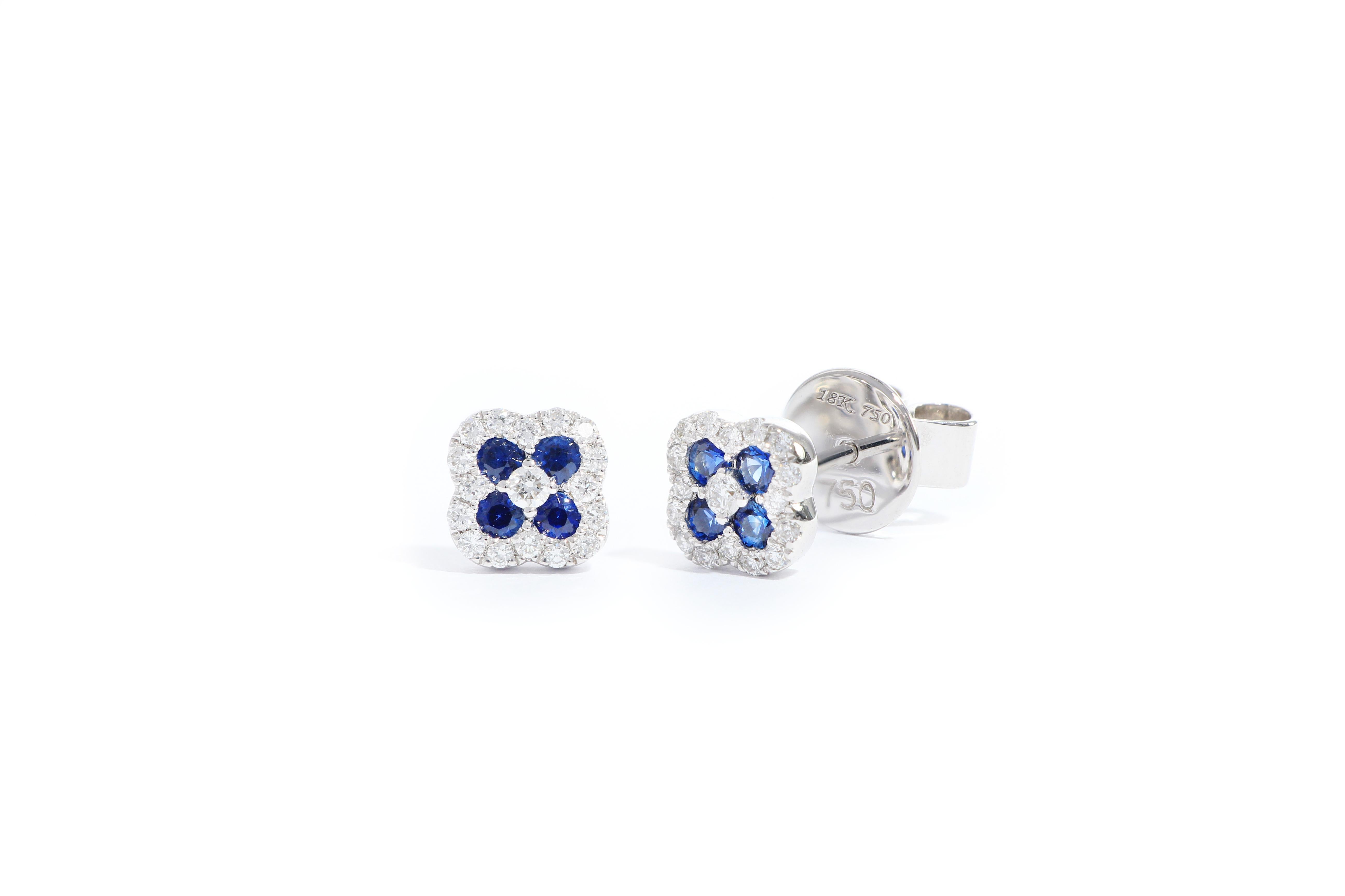 This Art Deco style earrings is very elegant and fashionable, set with natural sapphire  totaling 0.31cts in floral pattern,  decorated with brilliant-cut diamonds weighing 0.19cts, mounted in 18 karat white gold.
You could wear them for every