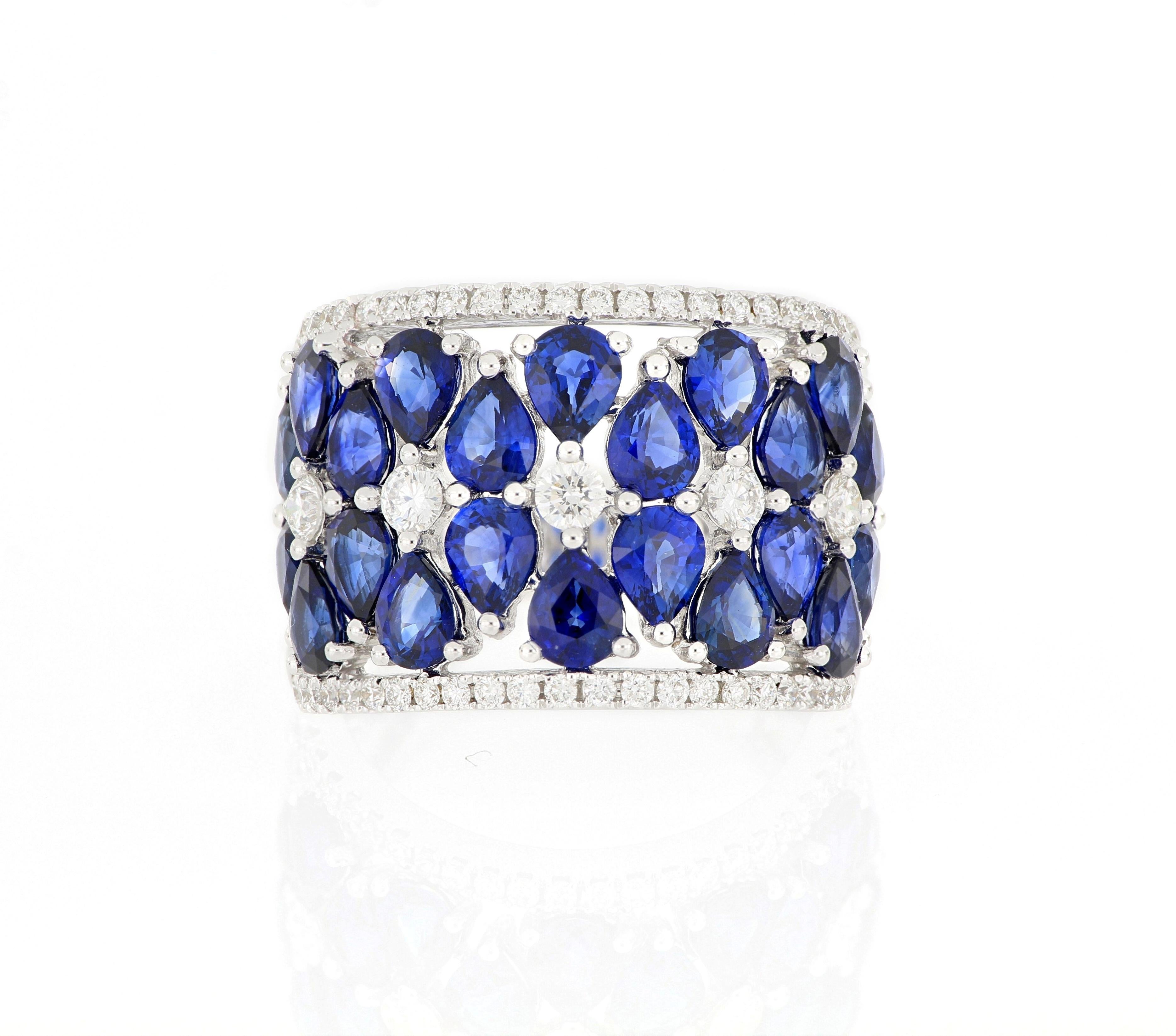 A stylish and elegant cocktail ring, composed of clusters of natural pear-shaped sapphire , surrounded by brilliant-cut diamonds, total weighing 5.61 carats and  0.67 carats respectively ,mounted in 18 karat gold. 
O’Che 1867 is renowned for its