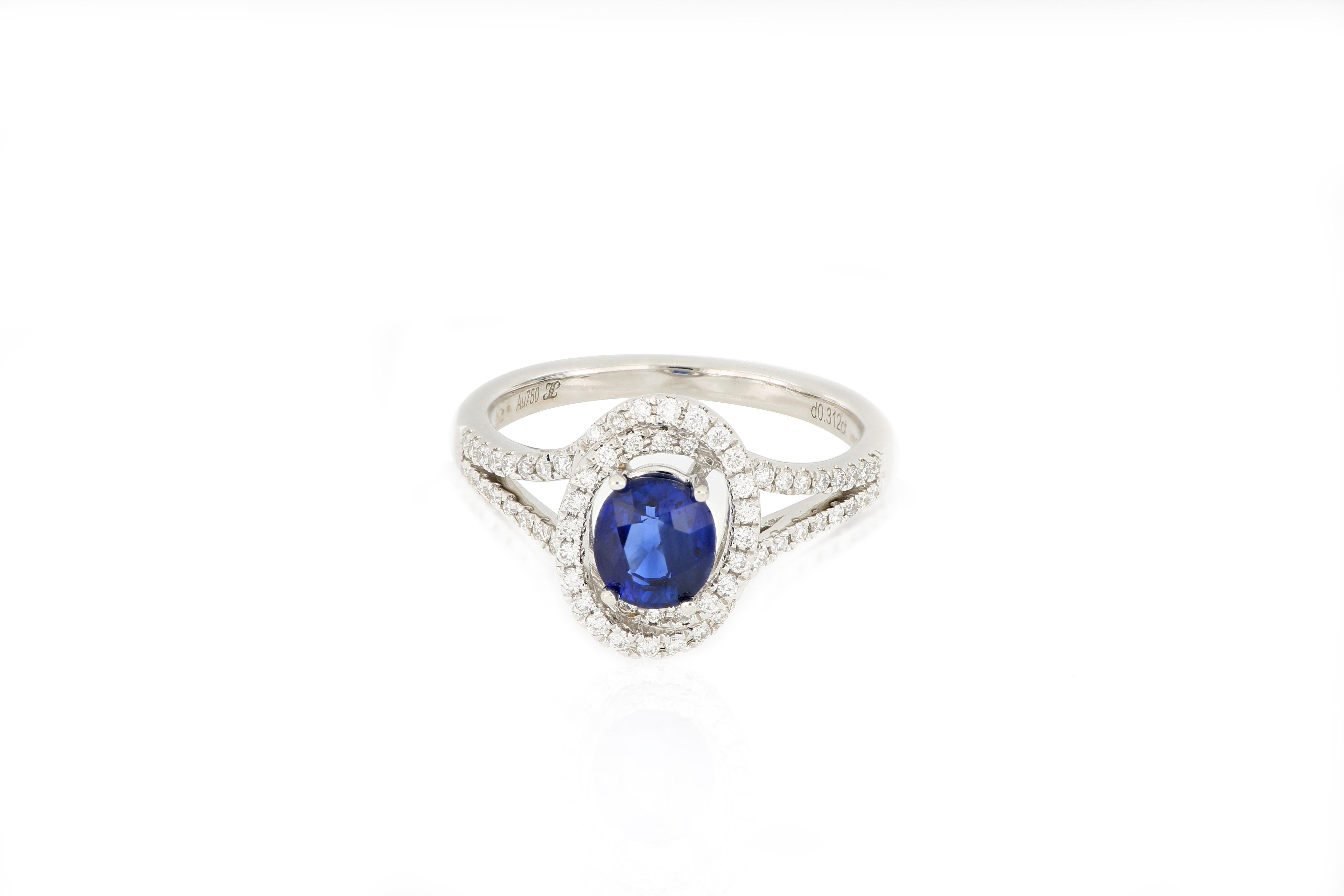 Contemporary 18 Karat White Gold Sapphire and Diamond Ring For Sale