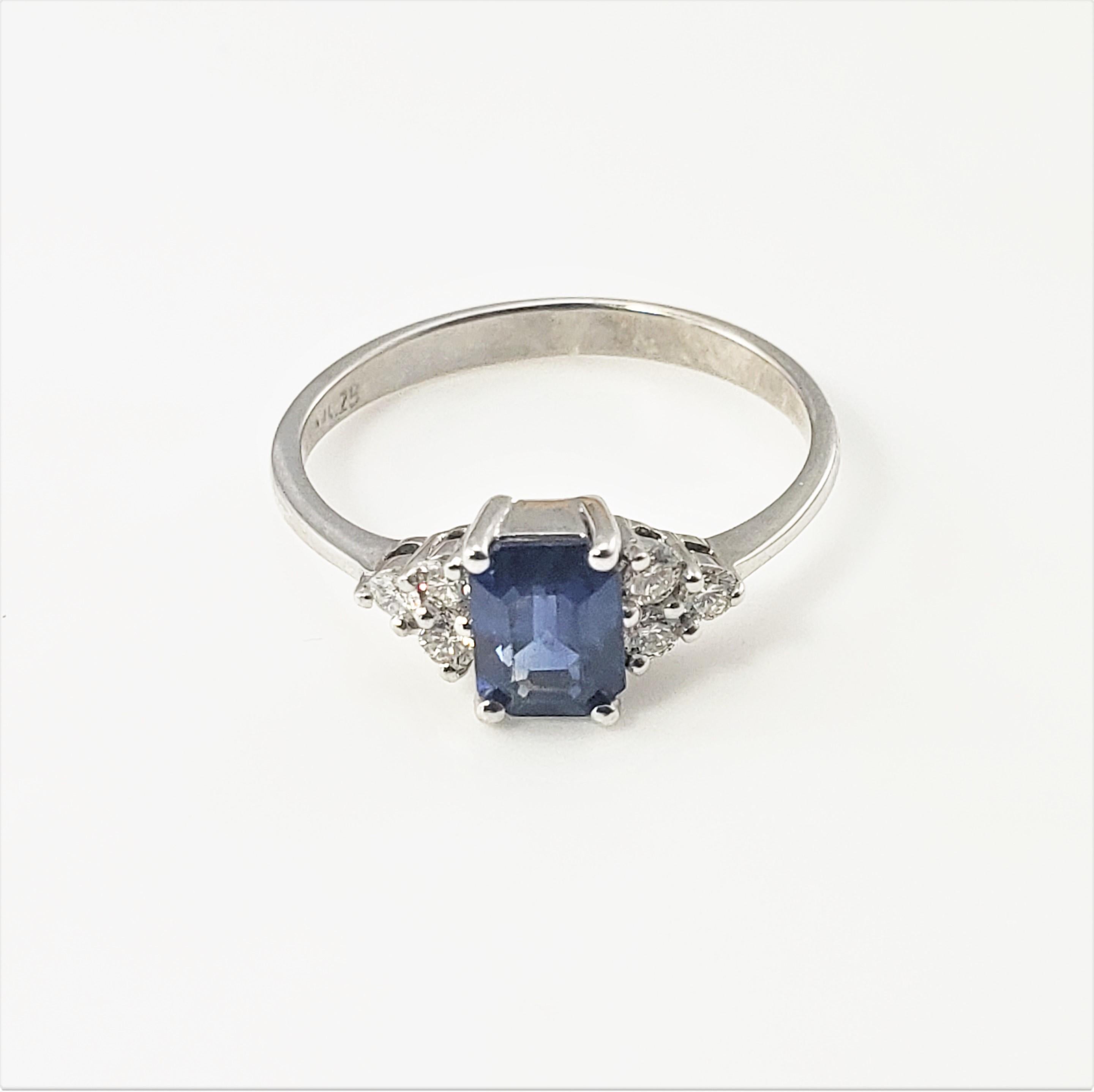 18 Karat White Gold Sapphire and Diamond Ring Size 5.75 GAI Certified-

This stunning ring features one rectangular sapphire (6 mm x 4 mm) and six round brilliant cut diamonds set in classic 18K white gold.  Shank: 2 mm.

Sapphire weight:  .91