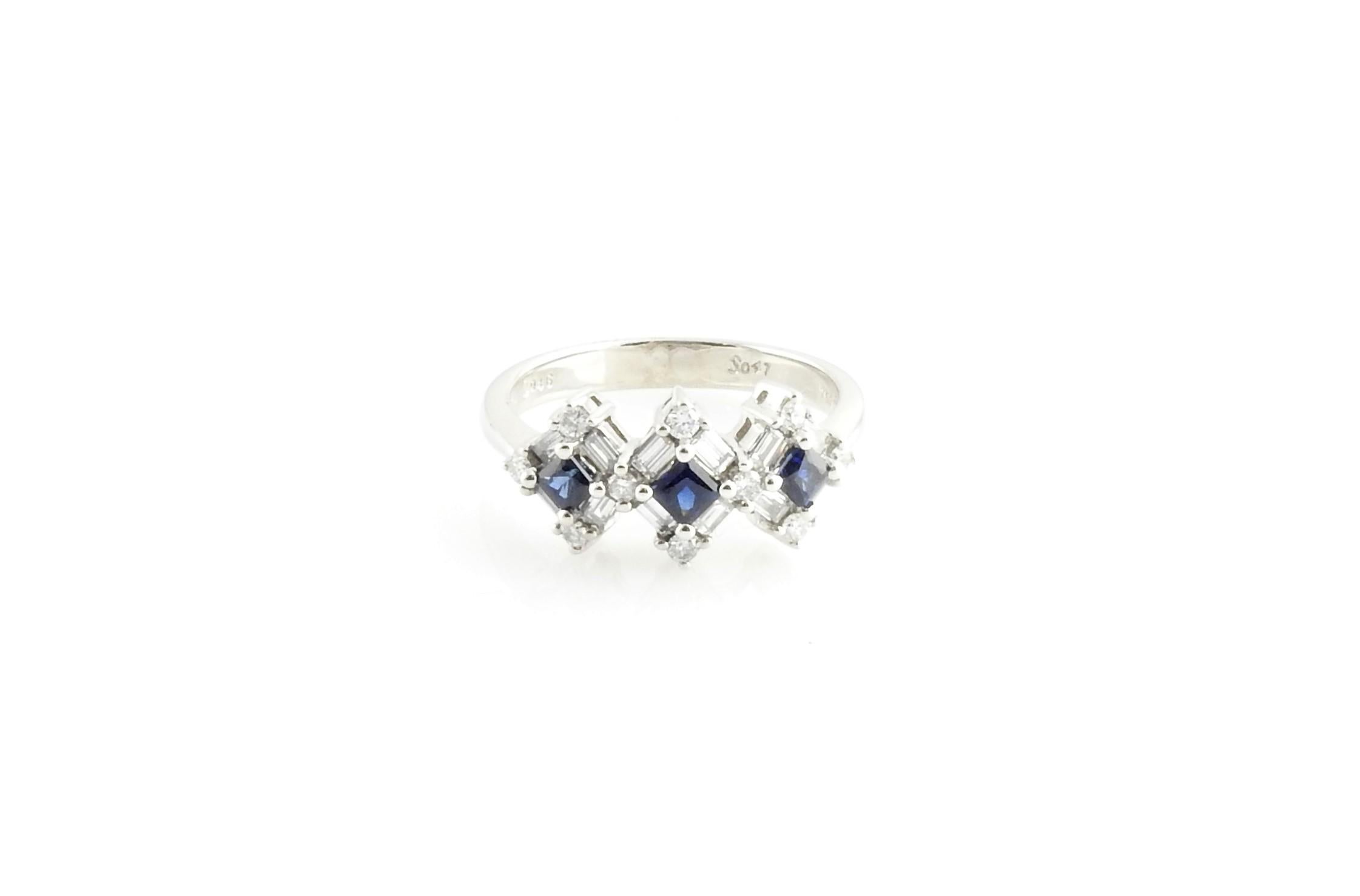 Vintage 18 Karat White Gold Natural Sapphire and Diamond Ring Size 6.75

This sparkling ring features ten round brilliant cut diamonds, 12 baguette diamonds and three square sapphires set in beautifully detailed

18K white gold.

Width: 9 mm. Shank: