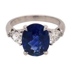 18 Karat White Gold Sapphire and Pear Shaped Diamond Ring