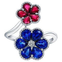 18 Karat White Gold Sapphire and Ruby Floral Bypass Ring