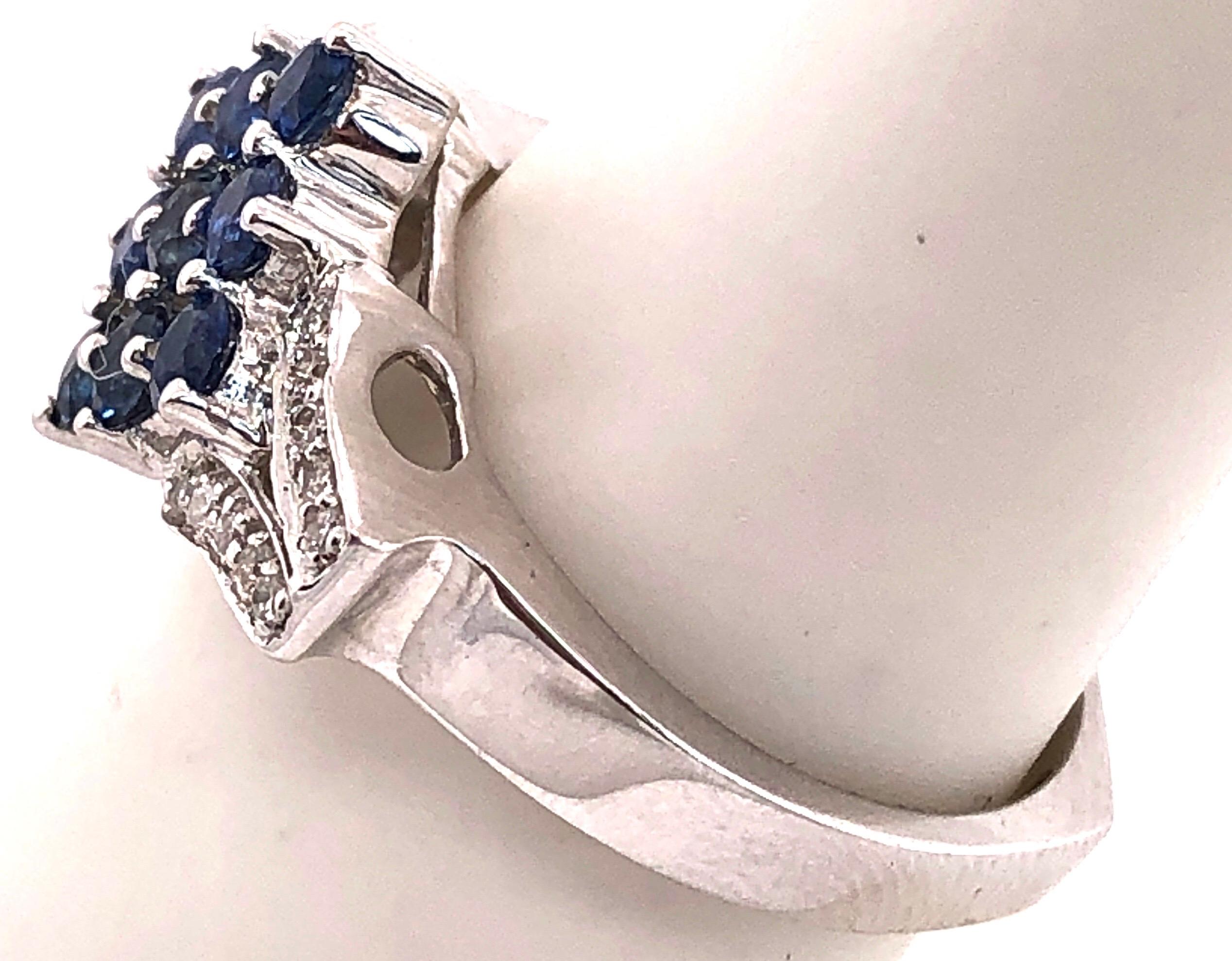 Women's or Men's 18 Karat White Gold Sapphire Cluster Fashion Ring with Diamond Accents 0.11 TDW For Sale