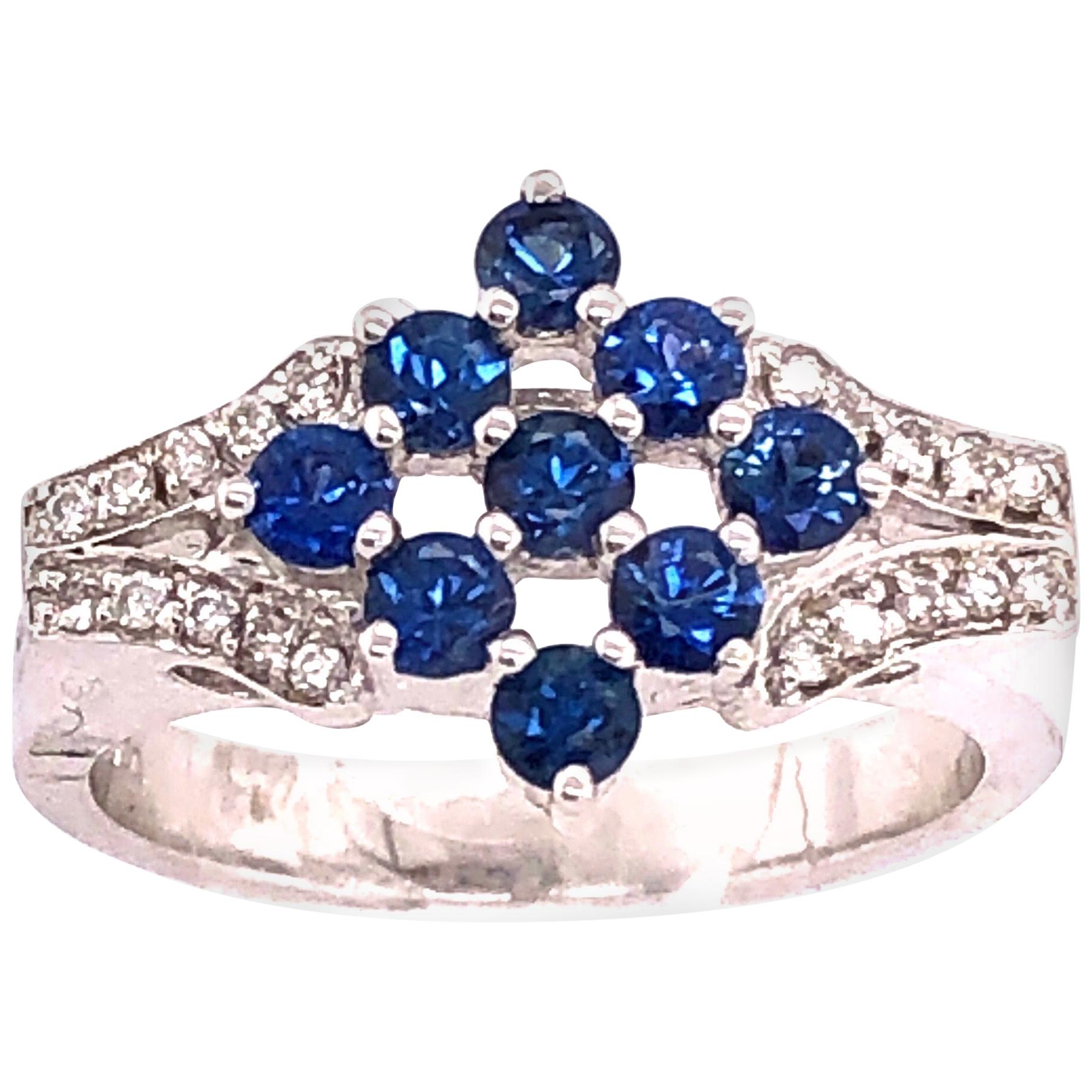 18 Karat White Gold Sapphire Cluster Fashion Ring with Diamond Accents 0.11 TDW For Sale