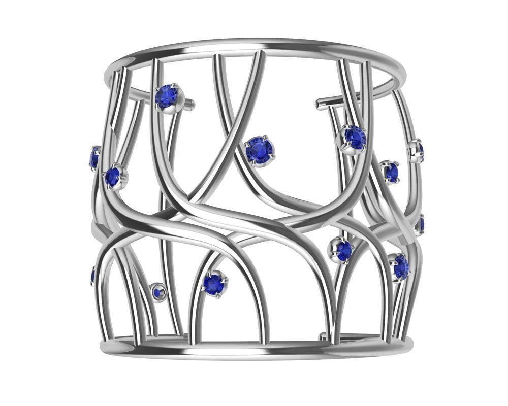 18K White Gold Sapphire Cuff Bracelet, October the best month to launch the Octopus Cuff.  So what Summer's over, you can still create your own waves this winter with this bracelet. Consider the sapphires as water spray from a huge wave. How will