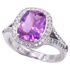 18 Karat White Gold Sapphire & Natural Diamond Halo Ring