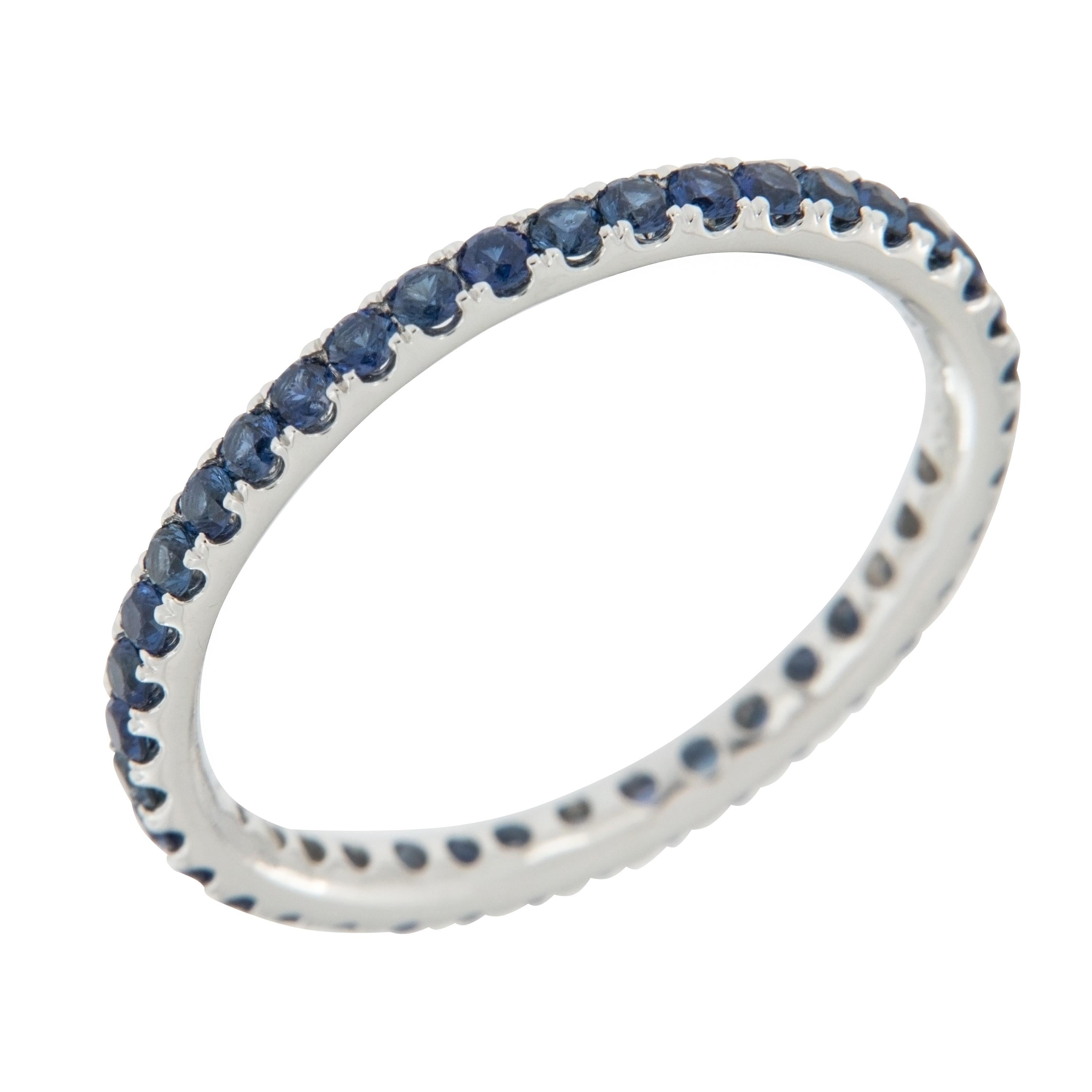 Serine is this 18 karat white gold blue sapphire eternity ring with 39 sapphires = 0.78 Cttw in a size 6! Sapphire is the birthstone for September and also given as a gem for the 5th, 23rd and 45th wedding anniversaries. This ring looks fantastic