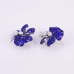 18 Carat White Gold Sapphire Invisible Flower Earrings